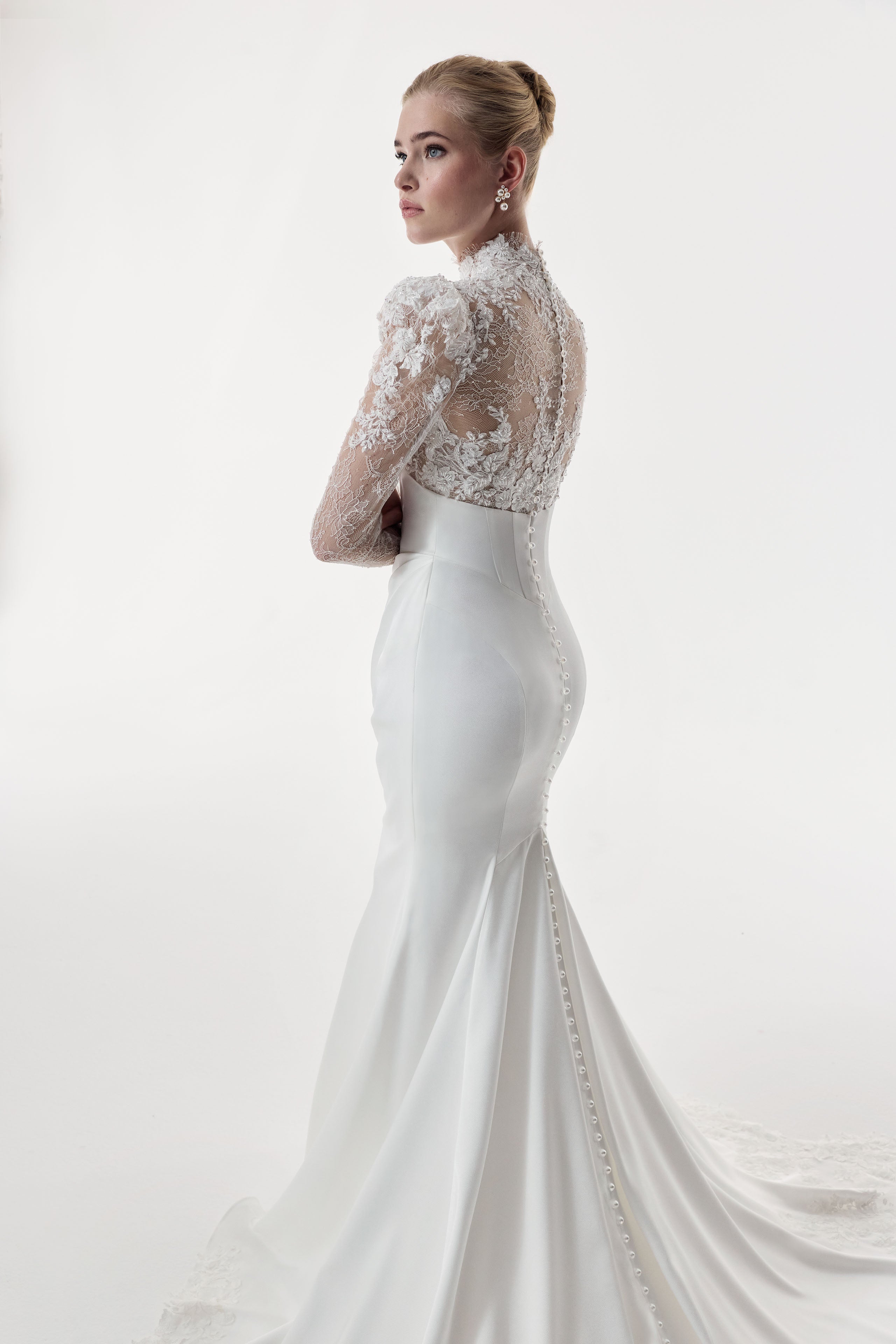 high neckline encrusted lace sleeves and bust, corset draped Japanese crepe skirt with illusion lace train dress