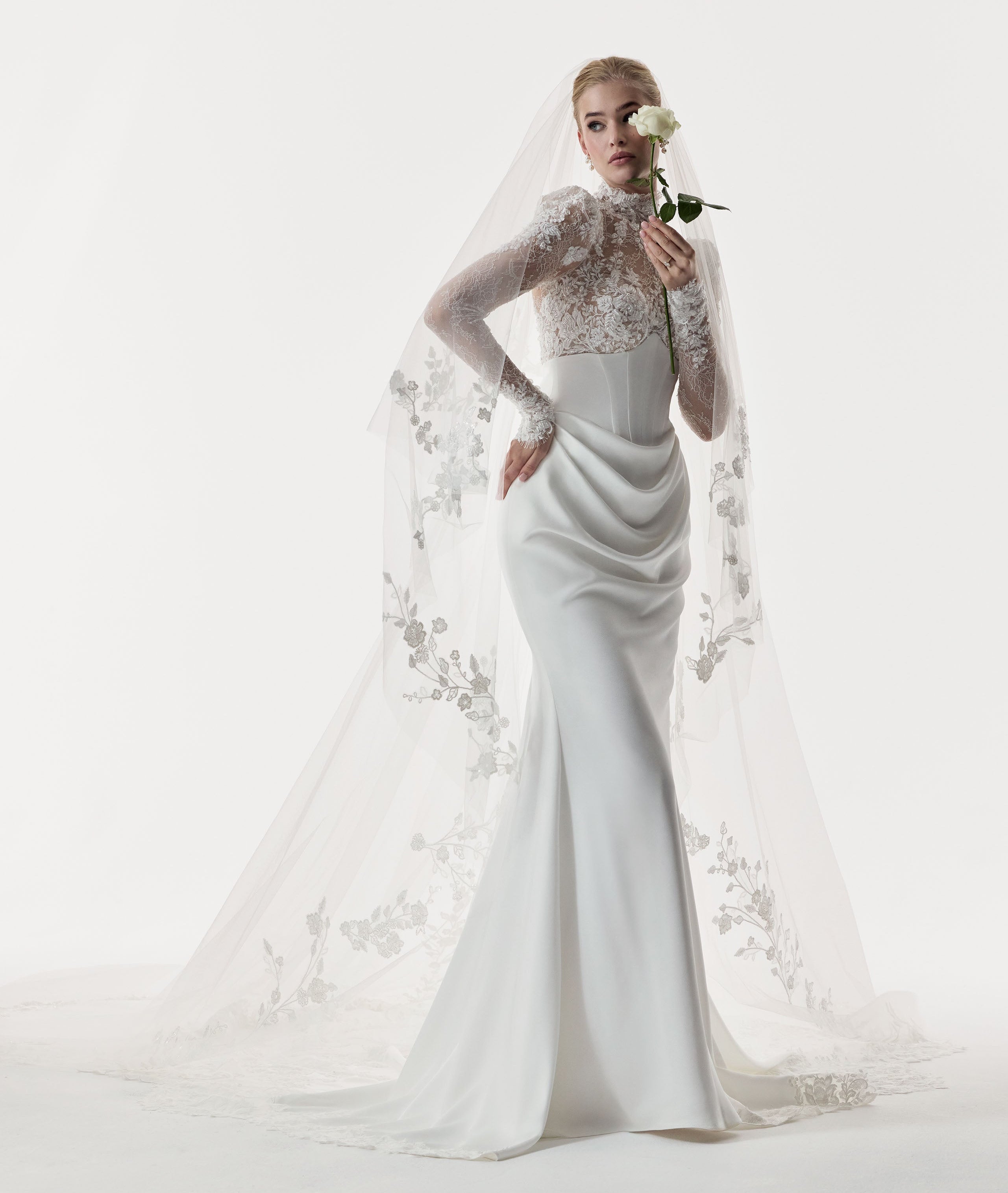 high neckline encrusted lace sleeves and bust, corset draped Japanese crepe skirt with illusion lace train