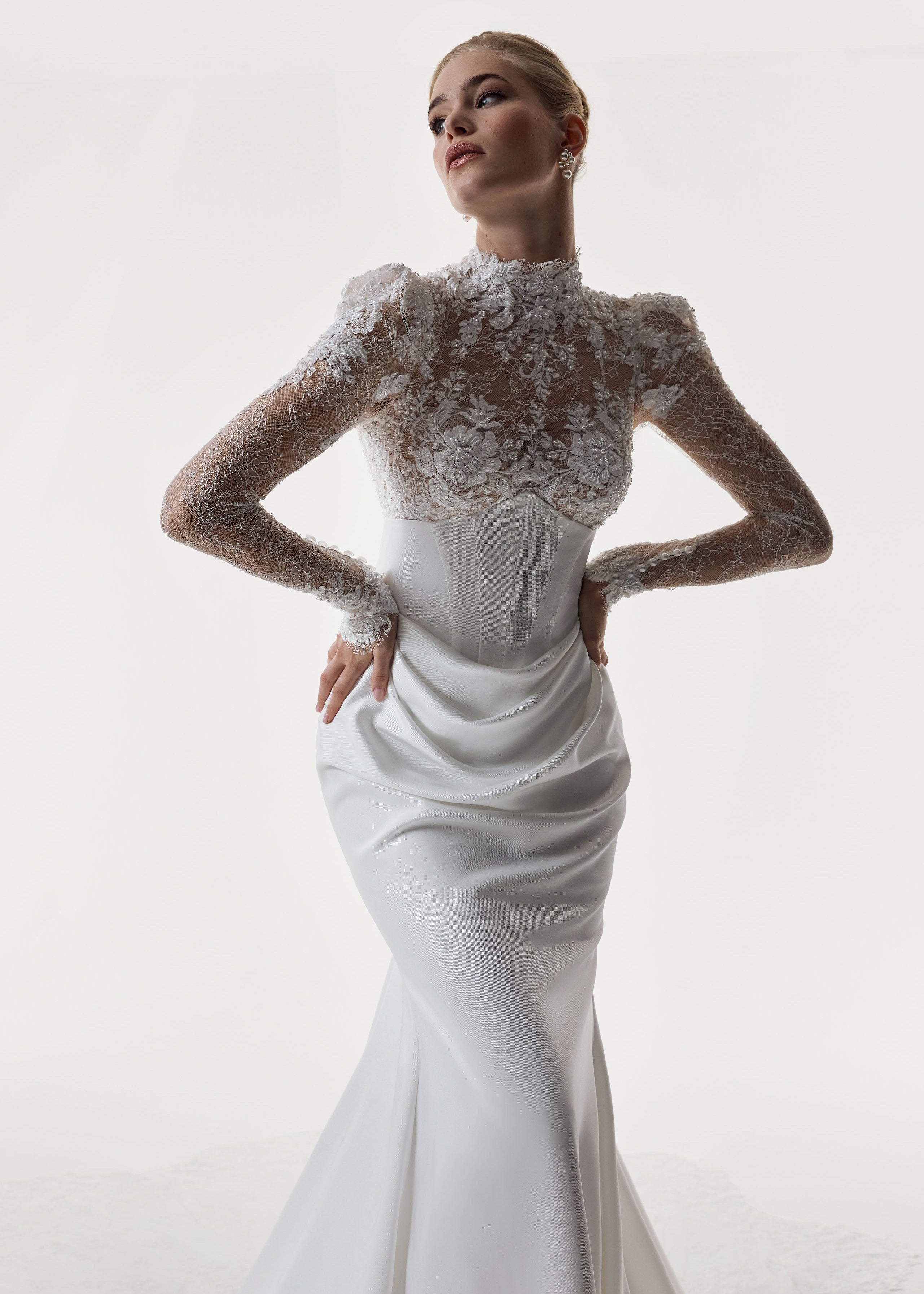 high neckline encrusted lace sleeves and bust, corset draped Japanese crepe skirt with illusion lace train