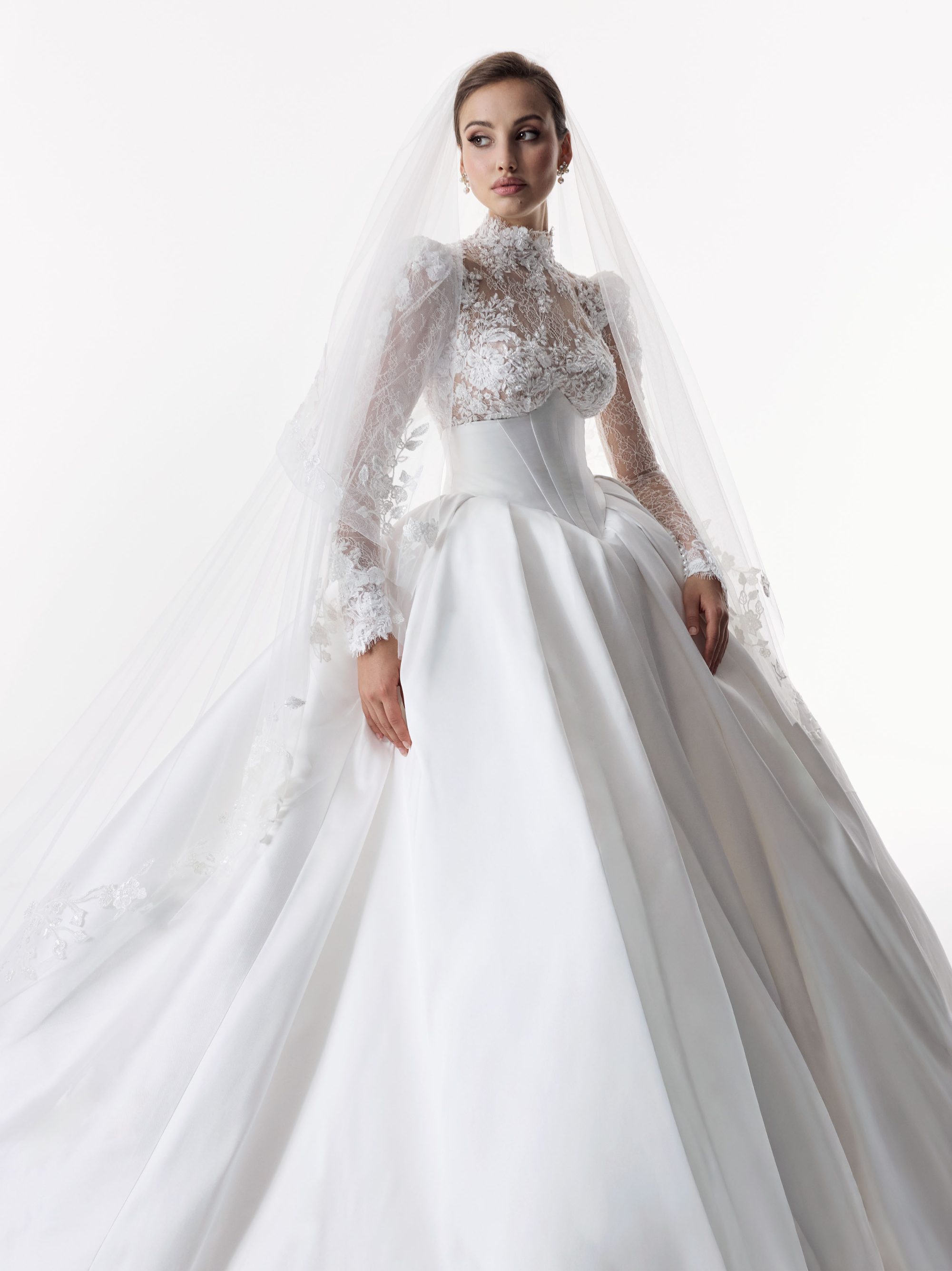 high neck encrusted lace long sleeve bodice with corset and basque waist with full silk mikado A-line ballgown skirt and lace veil