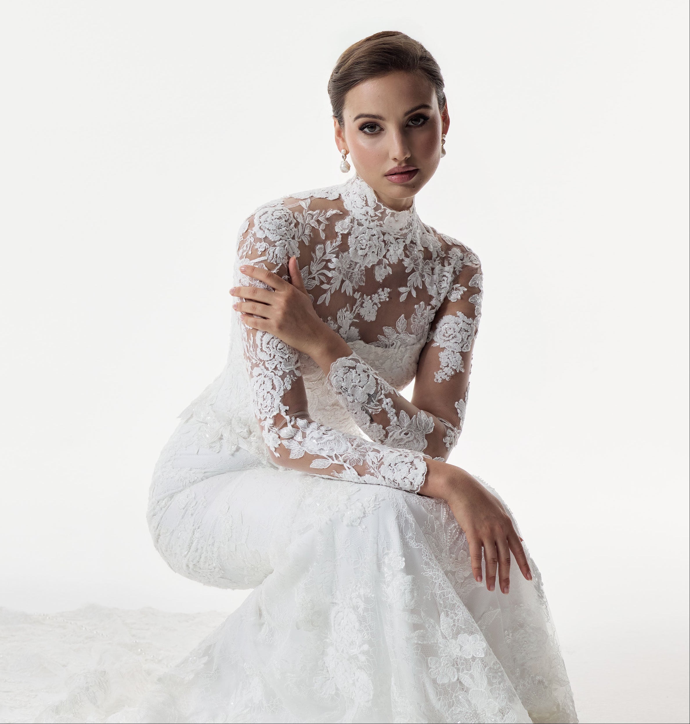 strapless scoop neckline embellished lace applique layered over Chantilly lace corset bodice basque waist with a detachable fitted skirt with high neck long sleeve lace topper