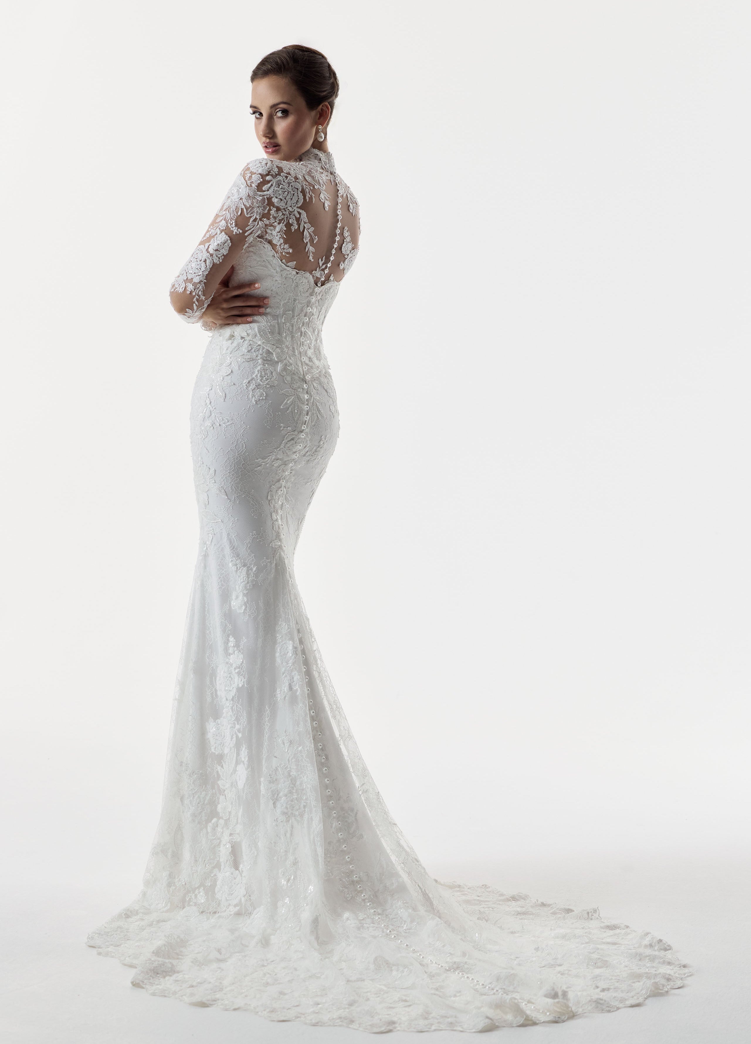 strapless scoop neckline embellished lace applique layered over Chantilly lace corset bodice basque waist with a detachable fitted skirt with high neck long sleeve lace topper with pearl buttons