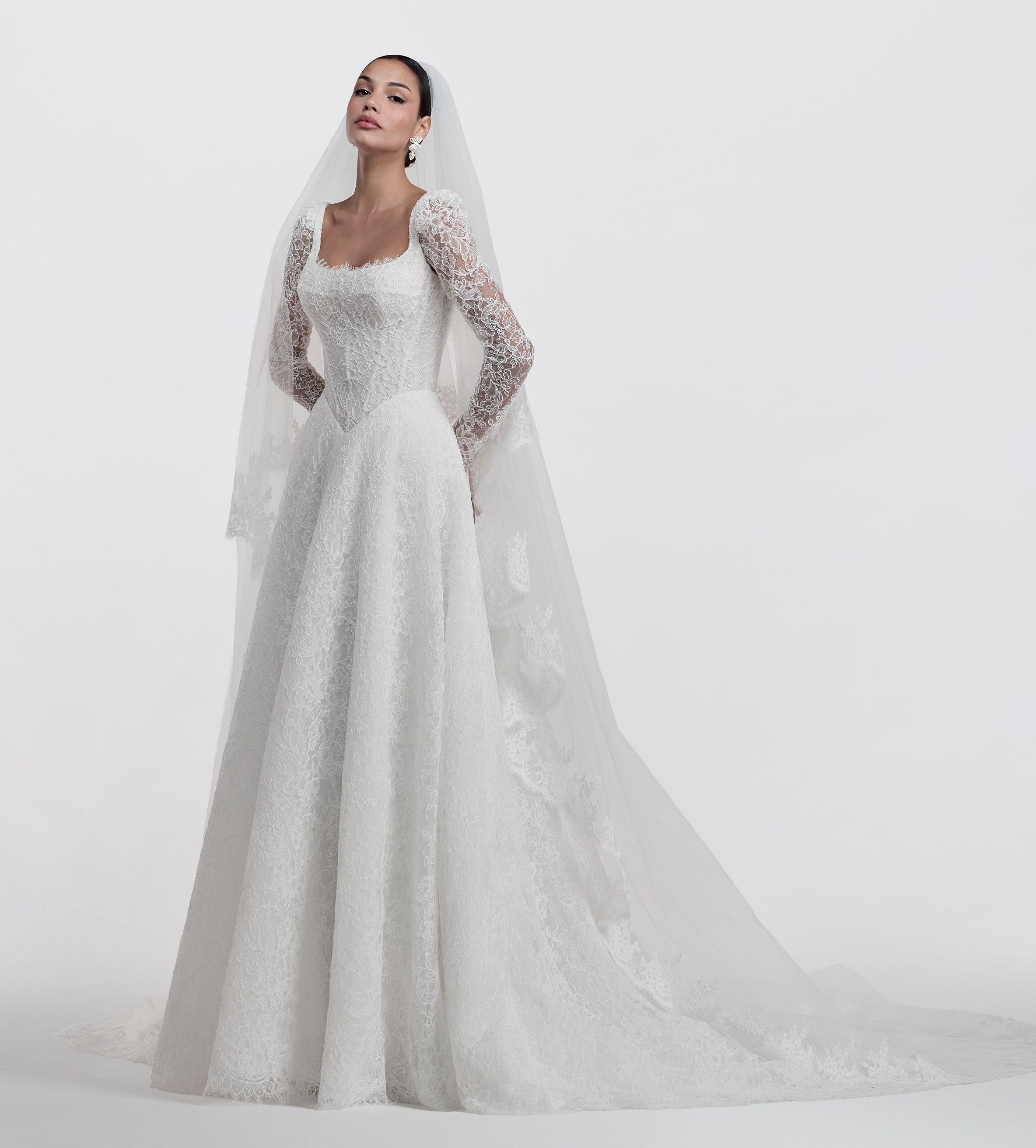 lace square neckline with basque waist and corset and A-line skirt with detachable sleeves and lace veil