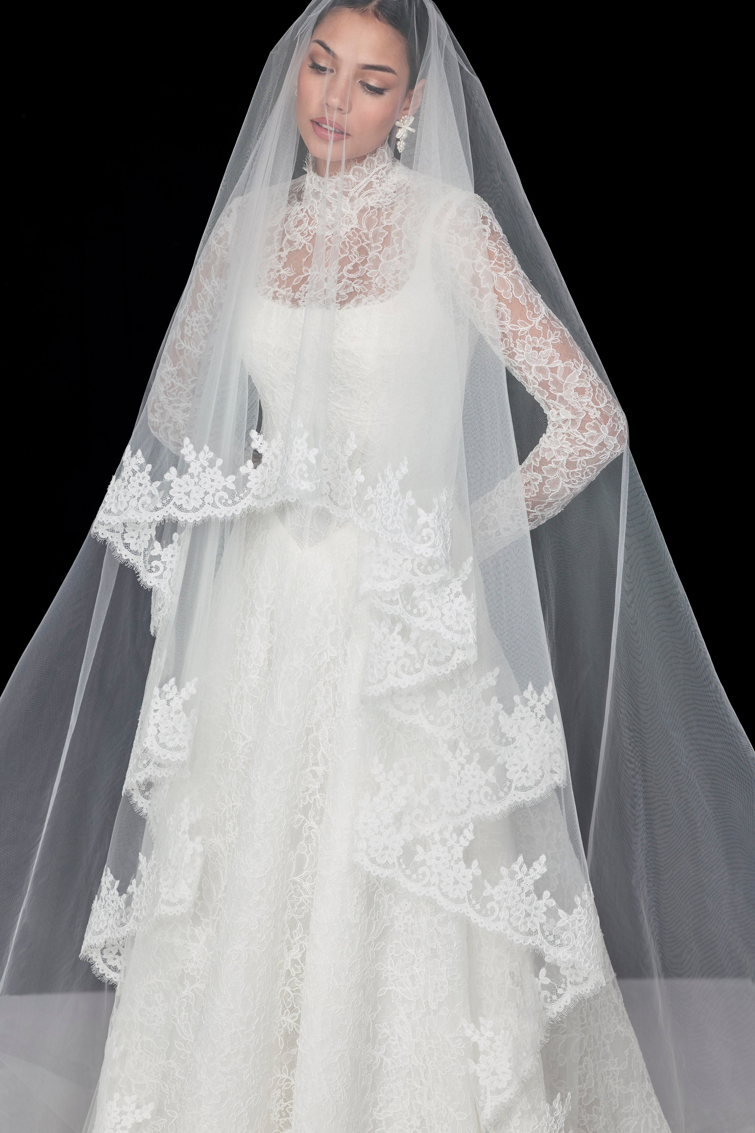 lace square neckline with basque waist and corset and A-line skirt with high beck lace topper and lace veil