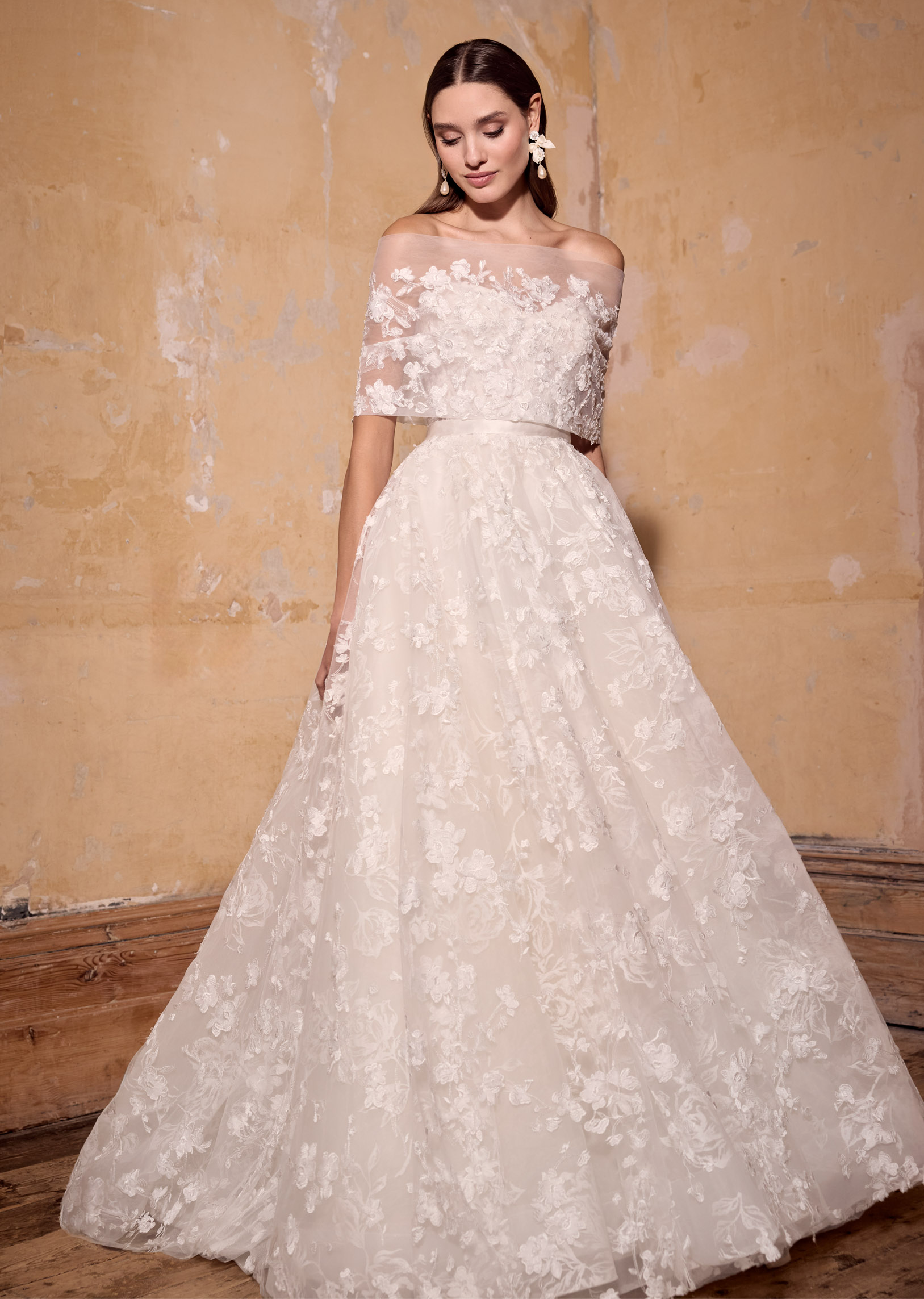 strapless A-line ballgown of 3d floral lace over rose-printed organza, lace up back with lux silk ribbon belt with matching lace wrap