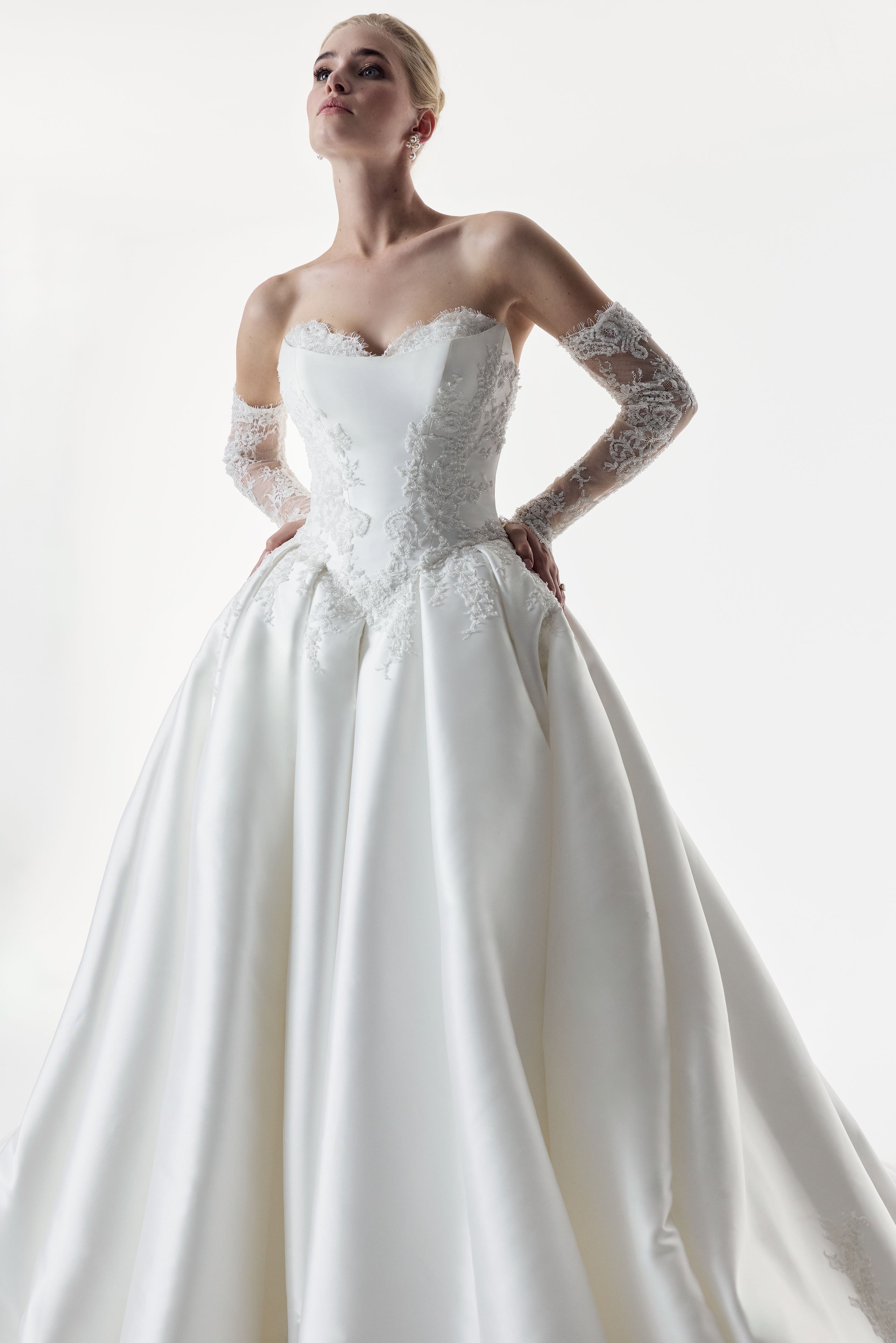sweetheart neckline with silk Mikado and beaded lace with a basque waist corset and full A-line ballgown skirt