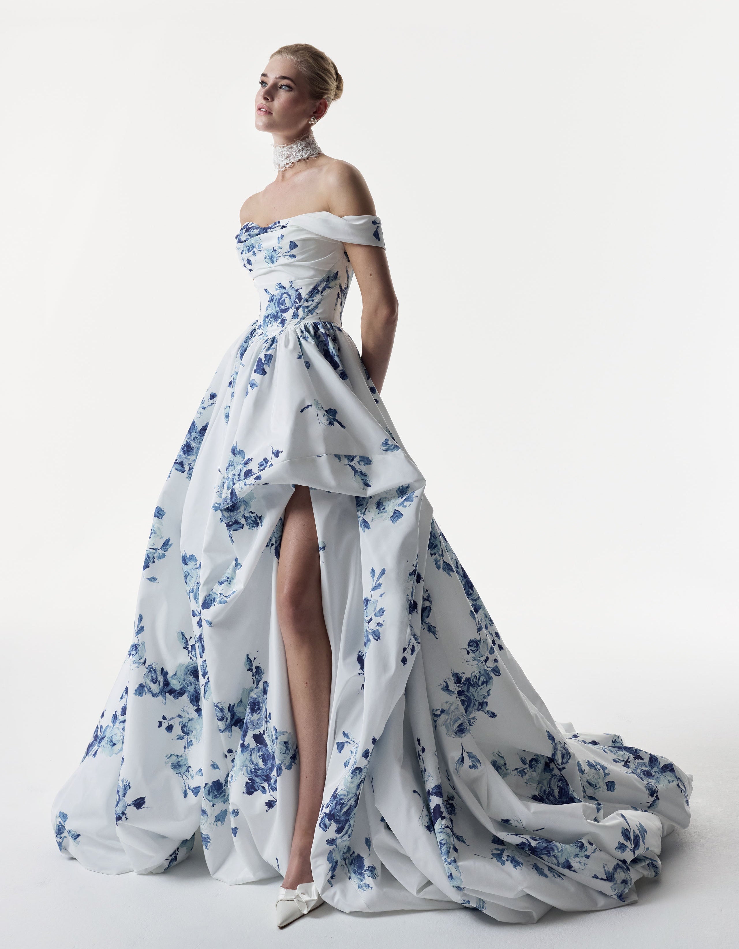 classic ivory and topaz floral print bardot neckline and corset basque waist and ruched pick-up skirt leg slit detailing