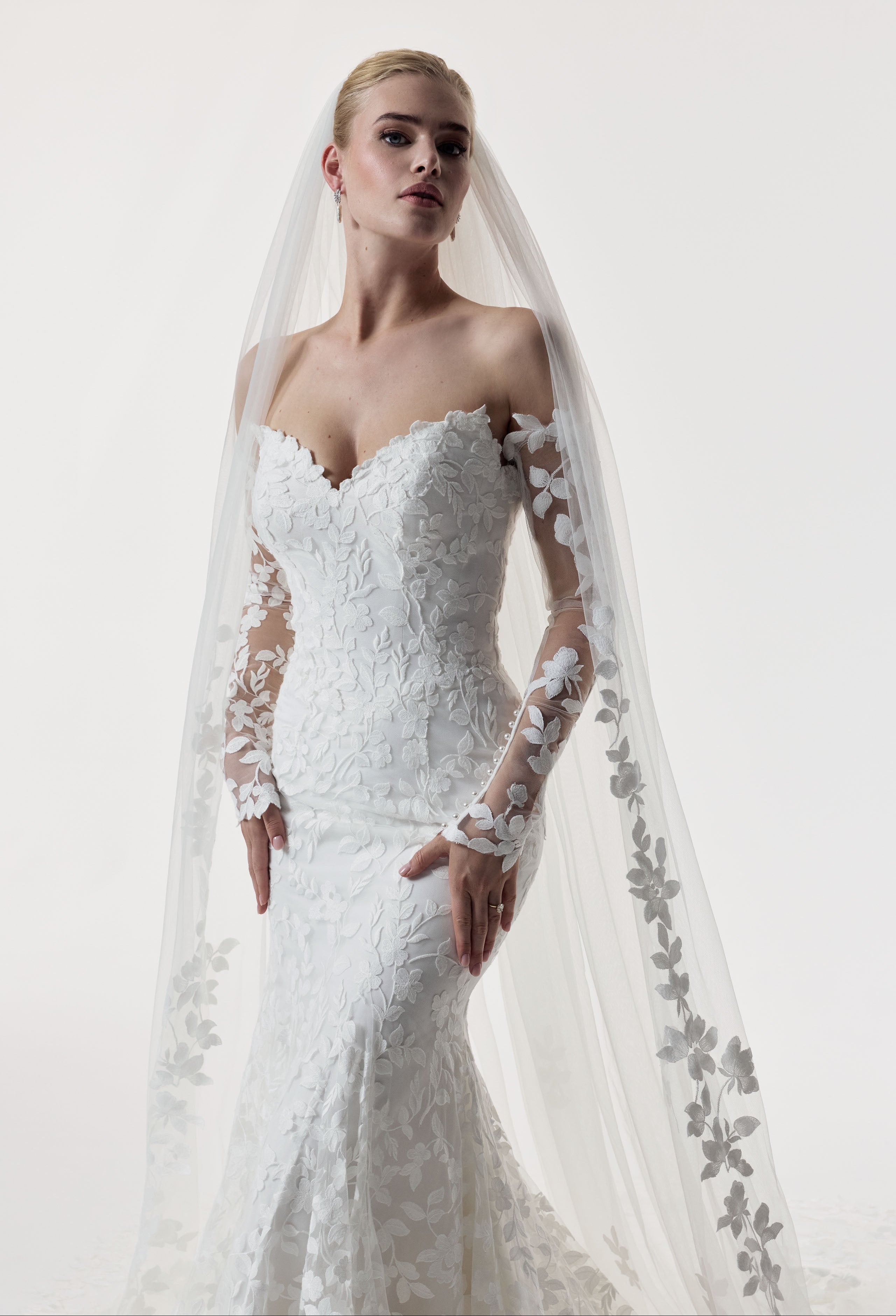 strapless sweetheart neckline fitted sheath dress leaf lace embroidery applique layered over delicate Chantilly lace with matching lace sleeves and wedding veil