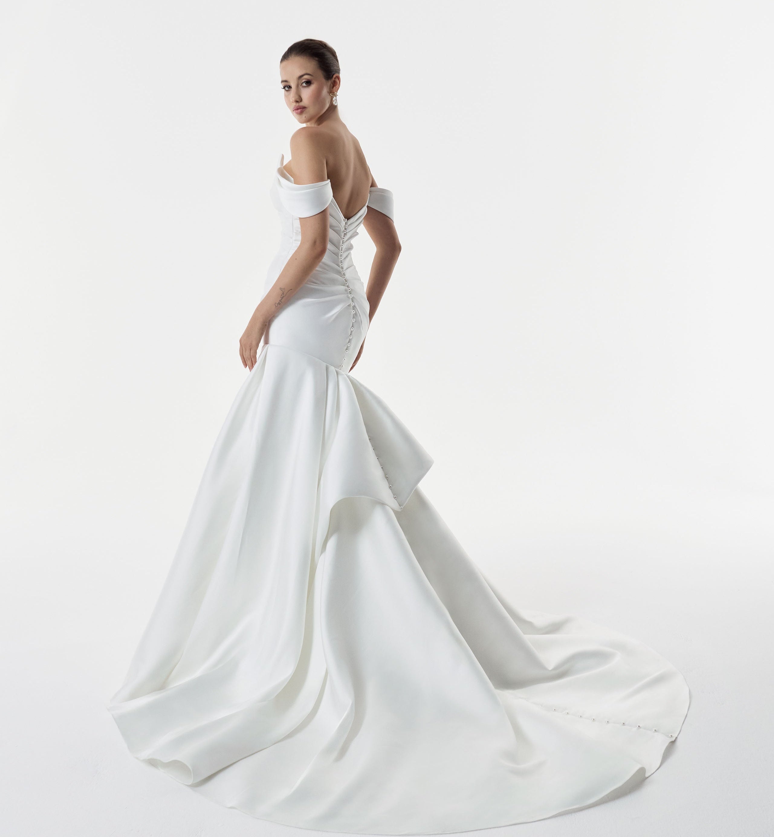 cat eye sweetheart neckline with dropped straps and Mikado pleated fitted mermaid dress with ruched back and pearl buttons