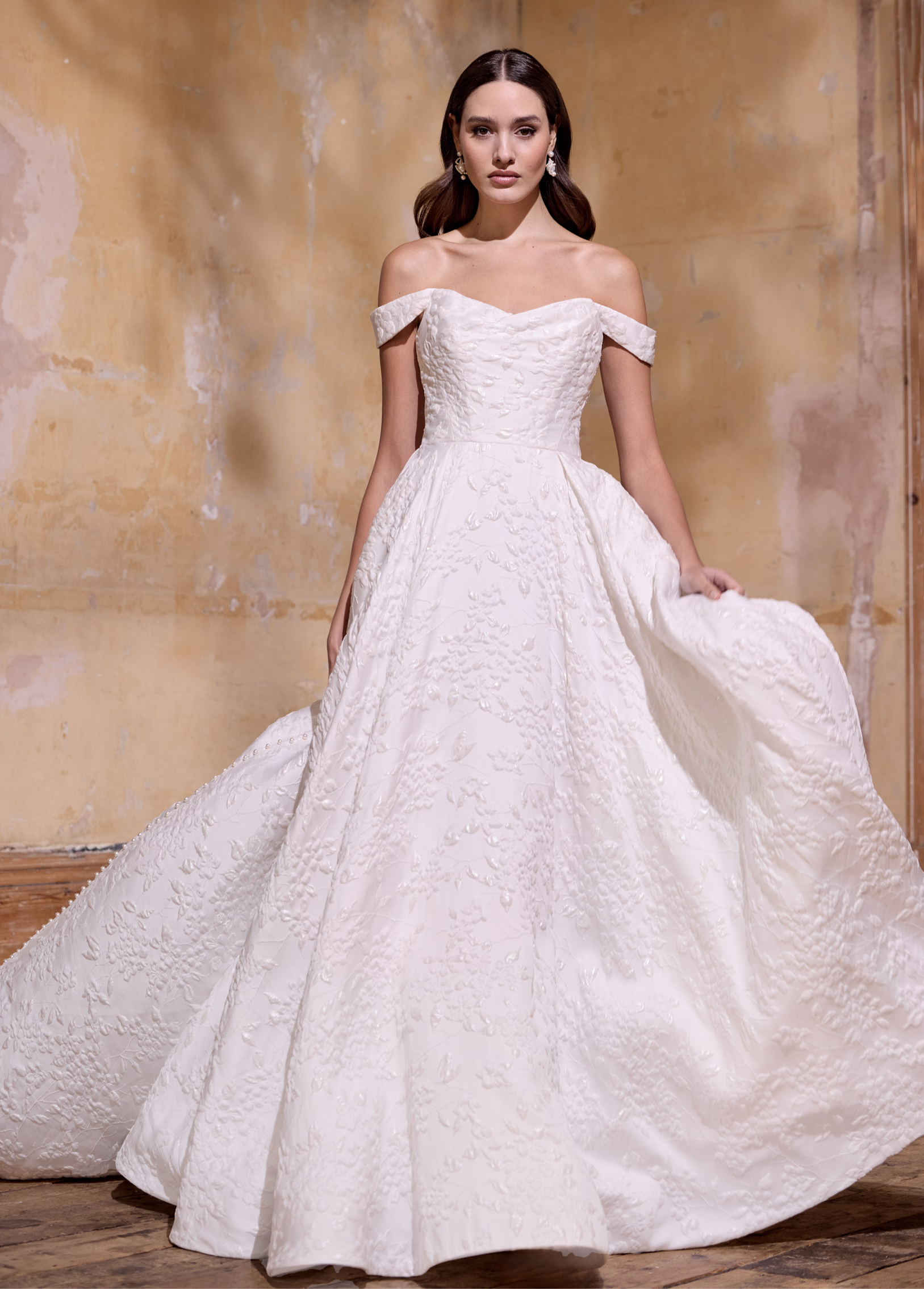 off the shoulder lux embossed silk jacquard with a draped bodice inner corset and full A-line skirt with pearl buttons and detachable straps