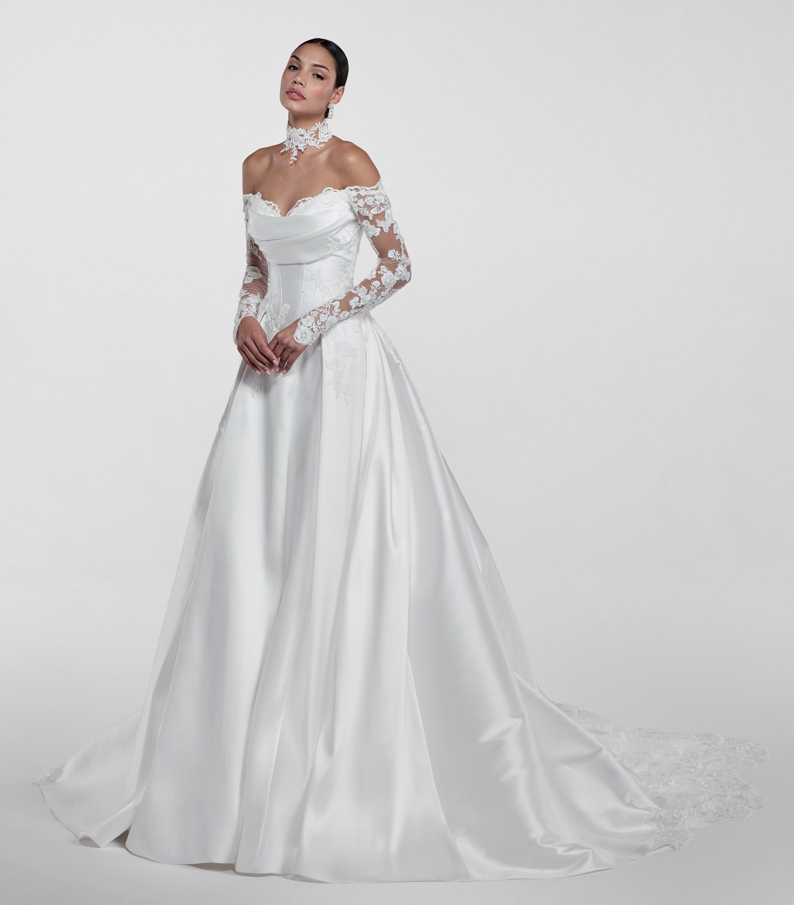 ruched lace applique sweetheart neckline with a draped bust and silk Mikado corset and A-line skirt and lace sleeves