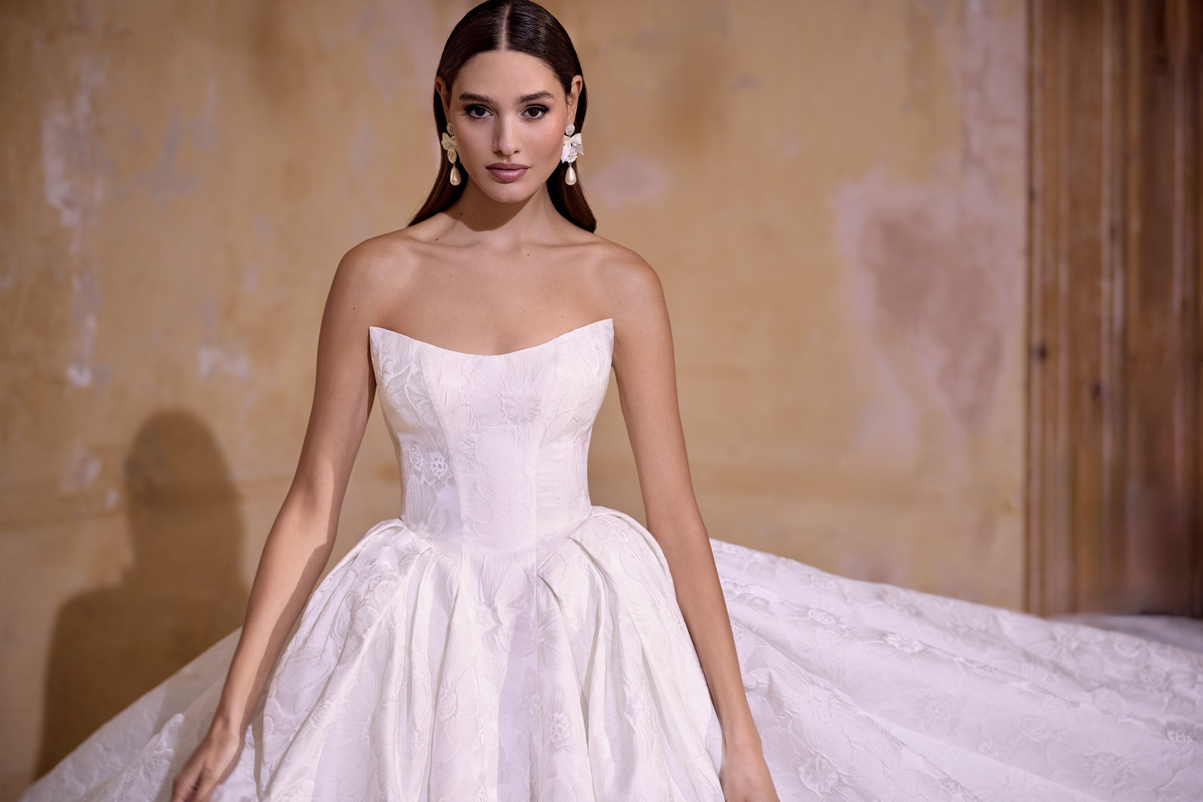 strapless scoop neckline embossed jacquard ballgown silhouette with dramatic train