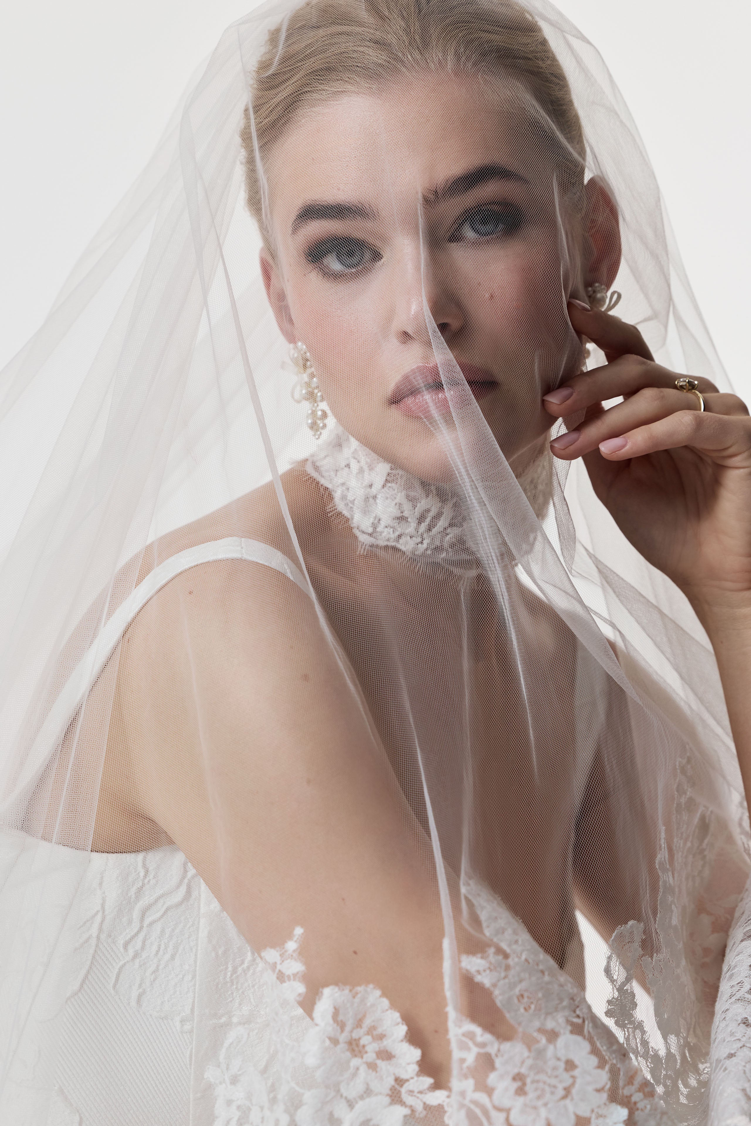 square neckline with basque waist A-Line skirt in silk embossed jacquard with lace choker and lace veil