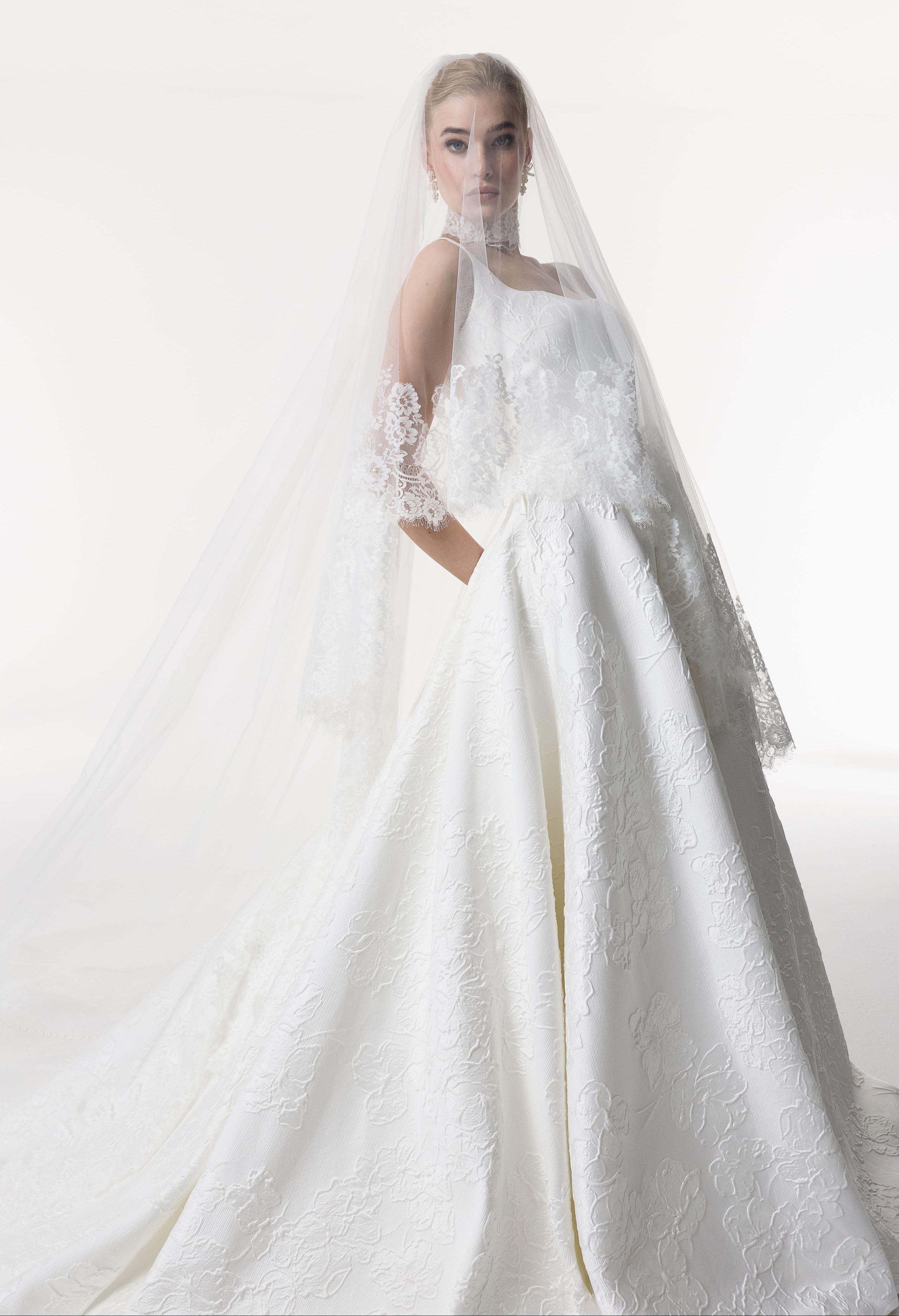 square neckline with basque waist A-Line skirt in silk embossed jacquard with lace choker and veil