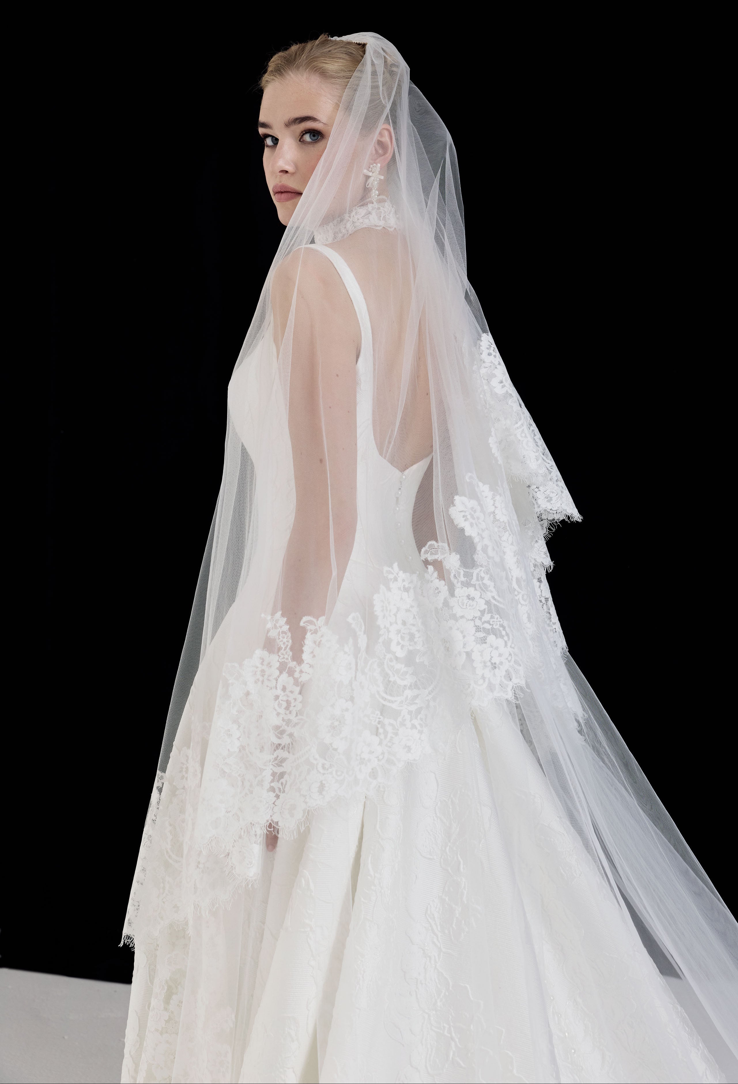 square neckline with basque waist A-Line skirt in silk embossed jacquard with lace choker and veil