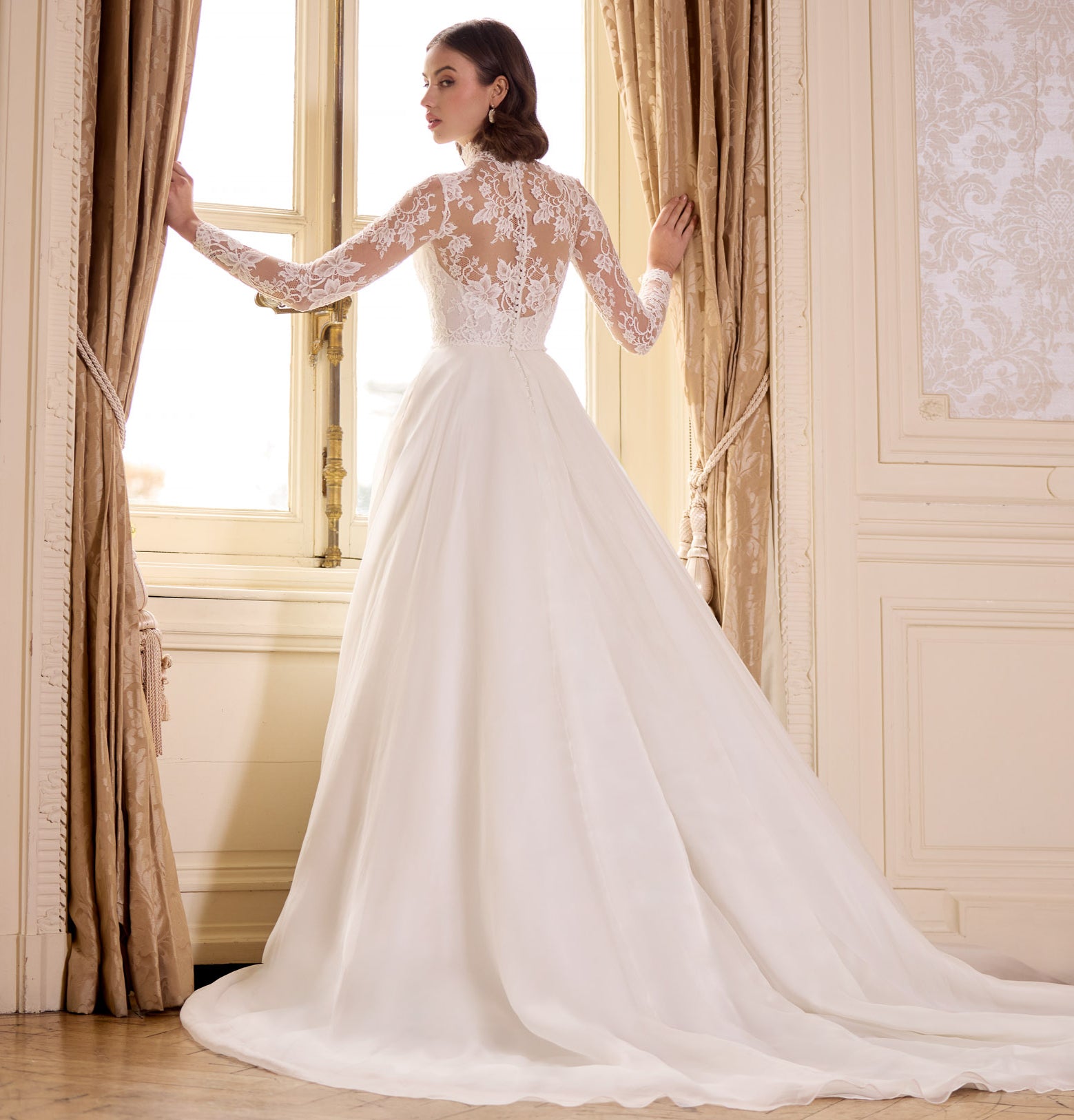 high neck, sweetheart neckline long sleeved lace corset bodice with a flattering plunge neckline and button back with a silk organza A-line skirt