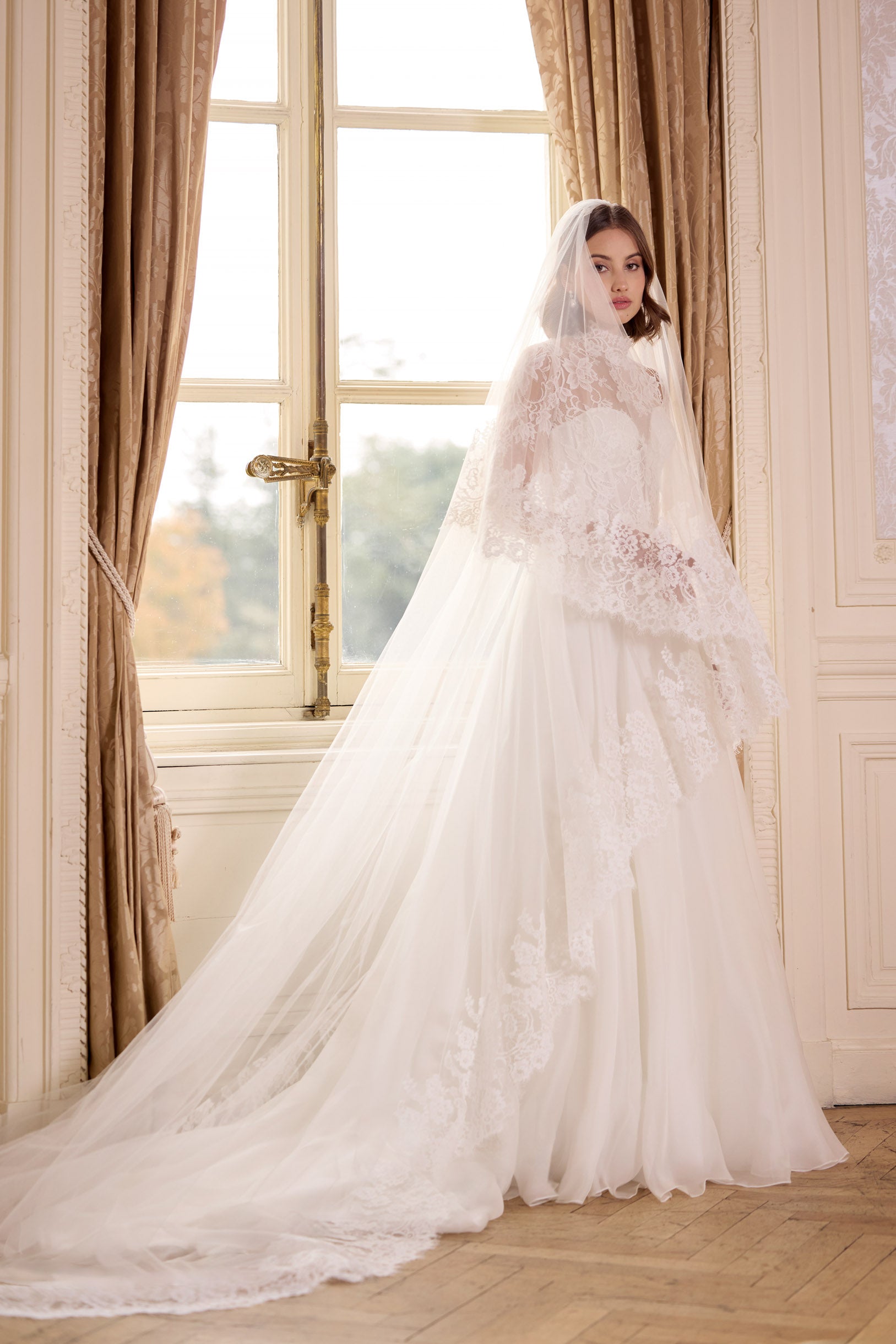 high neck, sweetheart neckline long sleeved lace corset bodice with a flattering plunge neckline and button back with a silk organza A-line skirt