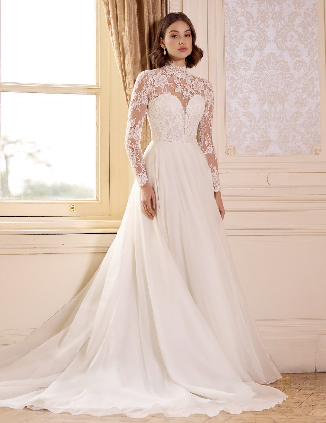 high neck, sweetheart neckline long sleeved lace corset bodice with a flattering plunge neckline and button back with a silk organza A-line skirt