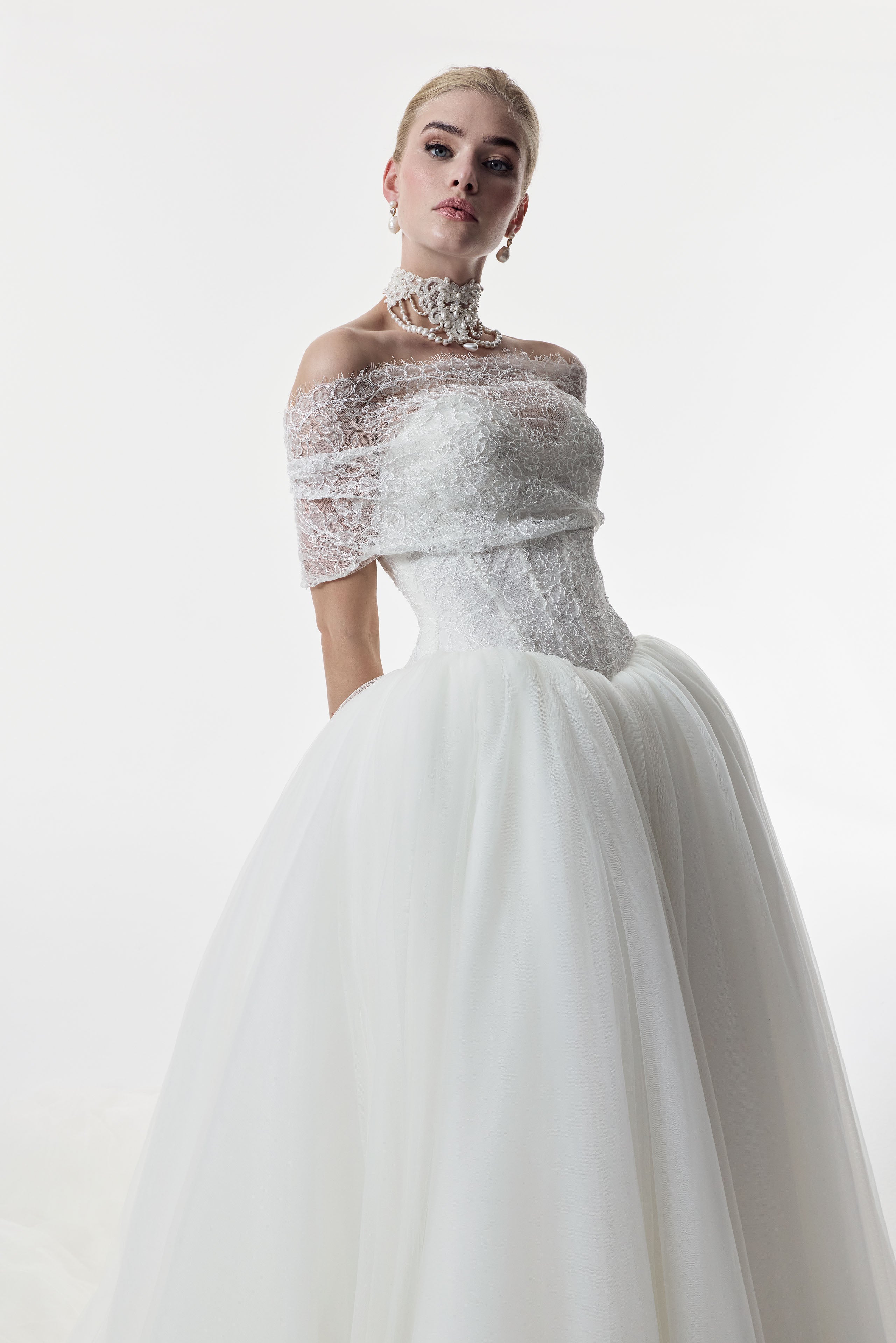 strapless sweetheart neckline corset basque waist bodice in corded French lace and full ballgown skirt in soft tulle
with lace wrap and choker