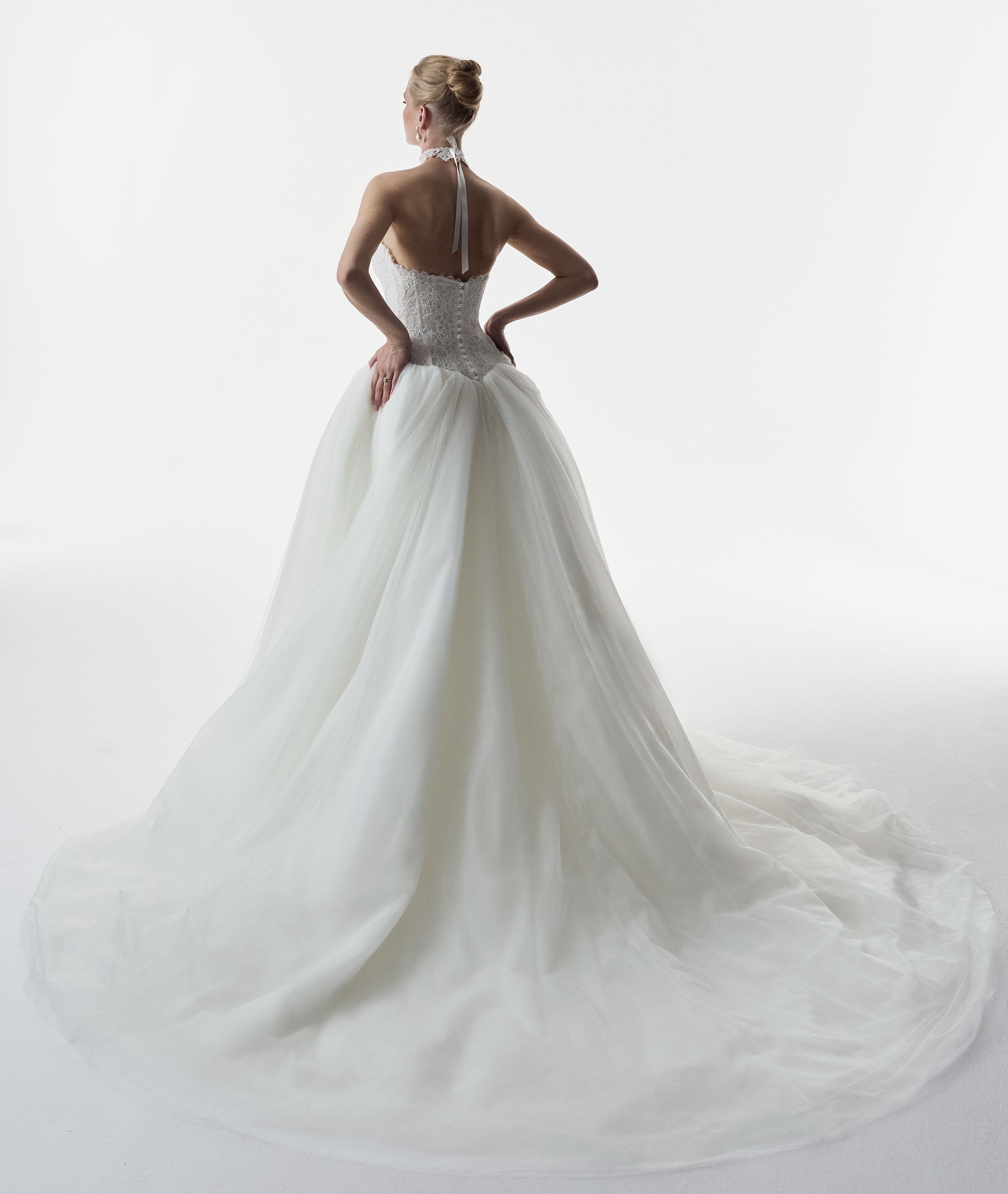 strapless sweetheart neckline corset basque waist bodice in corded French lace and full ballgown skirt in soft tulle with pearl buttons and choker