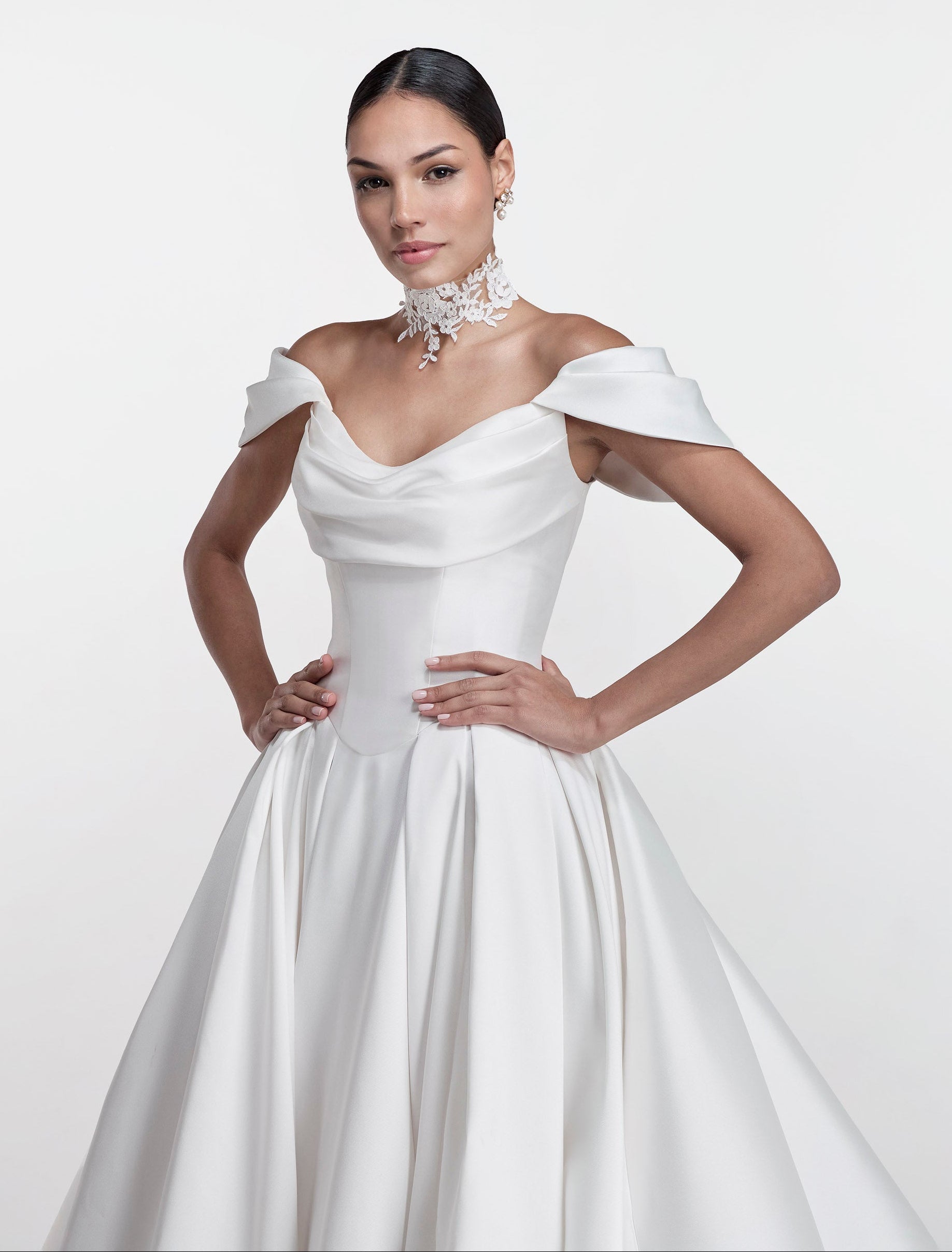 silk Mikado swoop neckline with a basque waist and pleated skirt