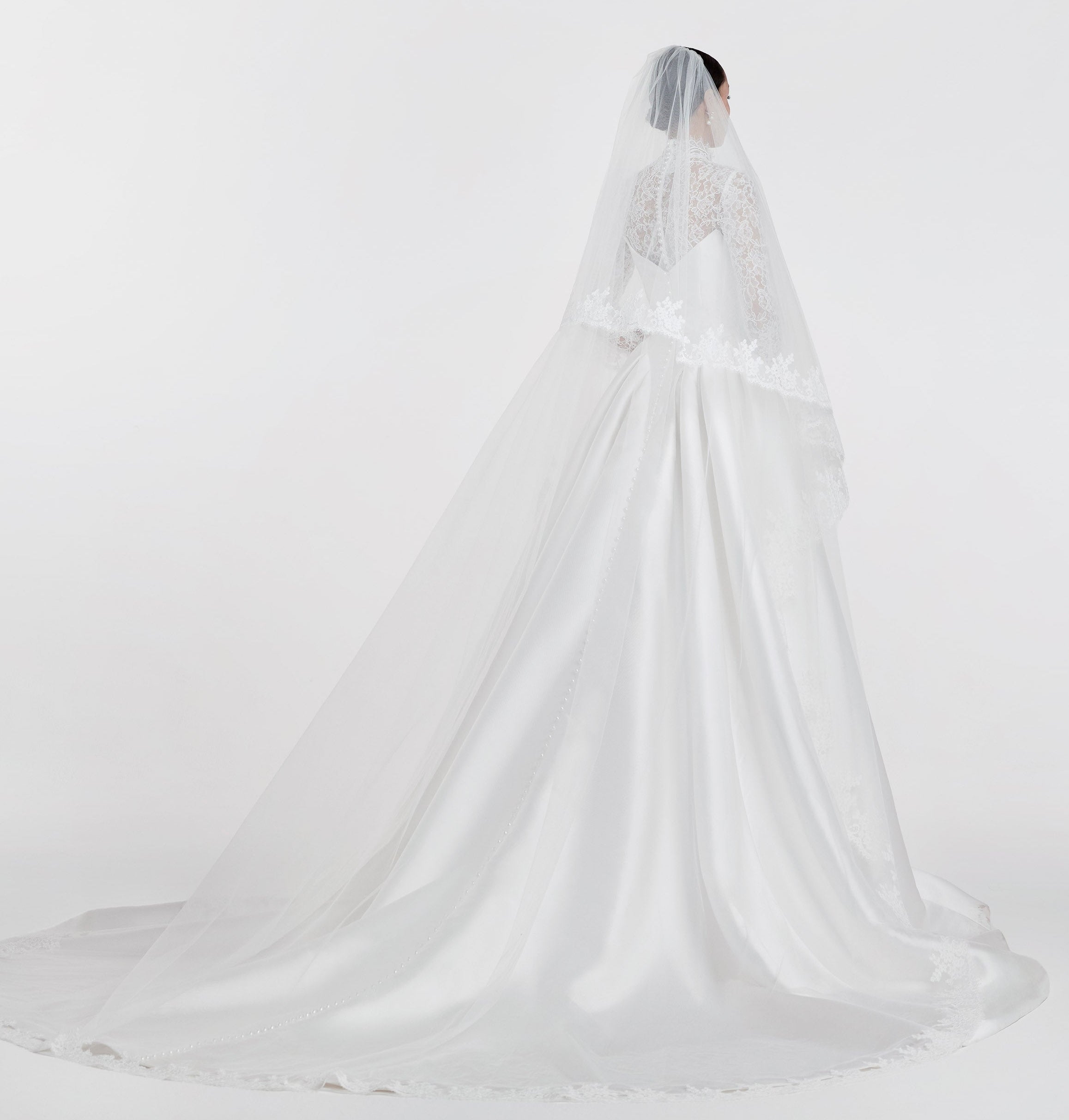 silk Mikado swoop neckline with a basque waist and pleated skirt