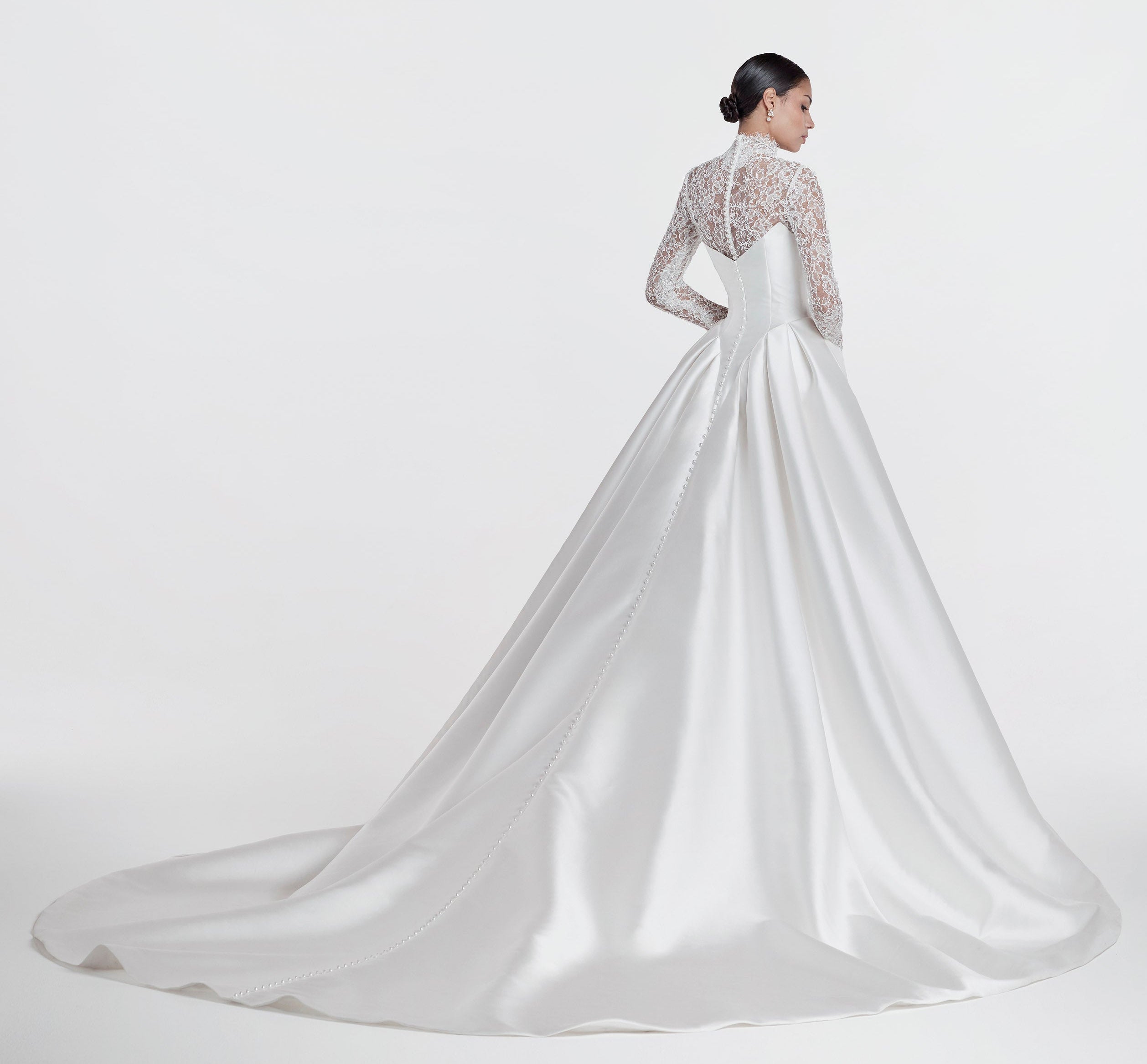 silk Mikado swoop neckline with a basque waist and pleated skirt