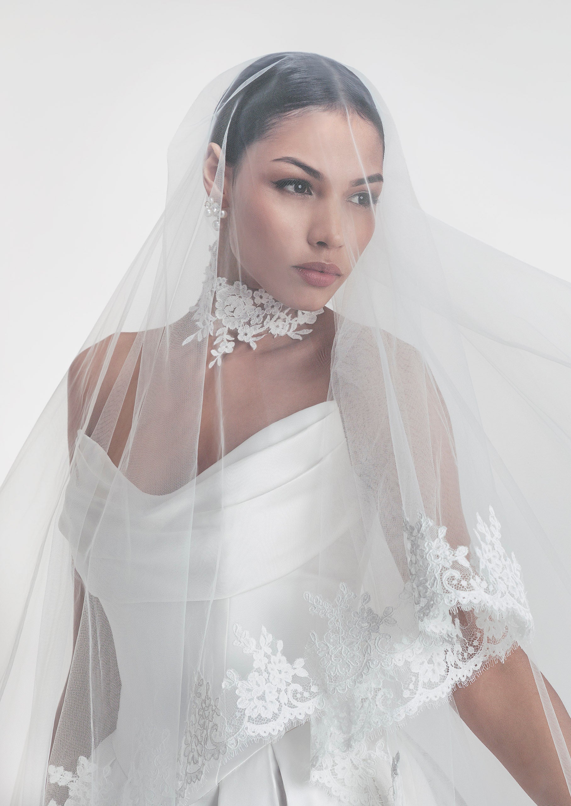 silk Mikado swoop neckline with a basque waist and pleated skirt