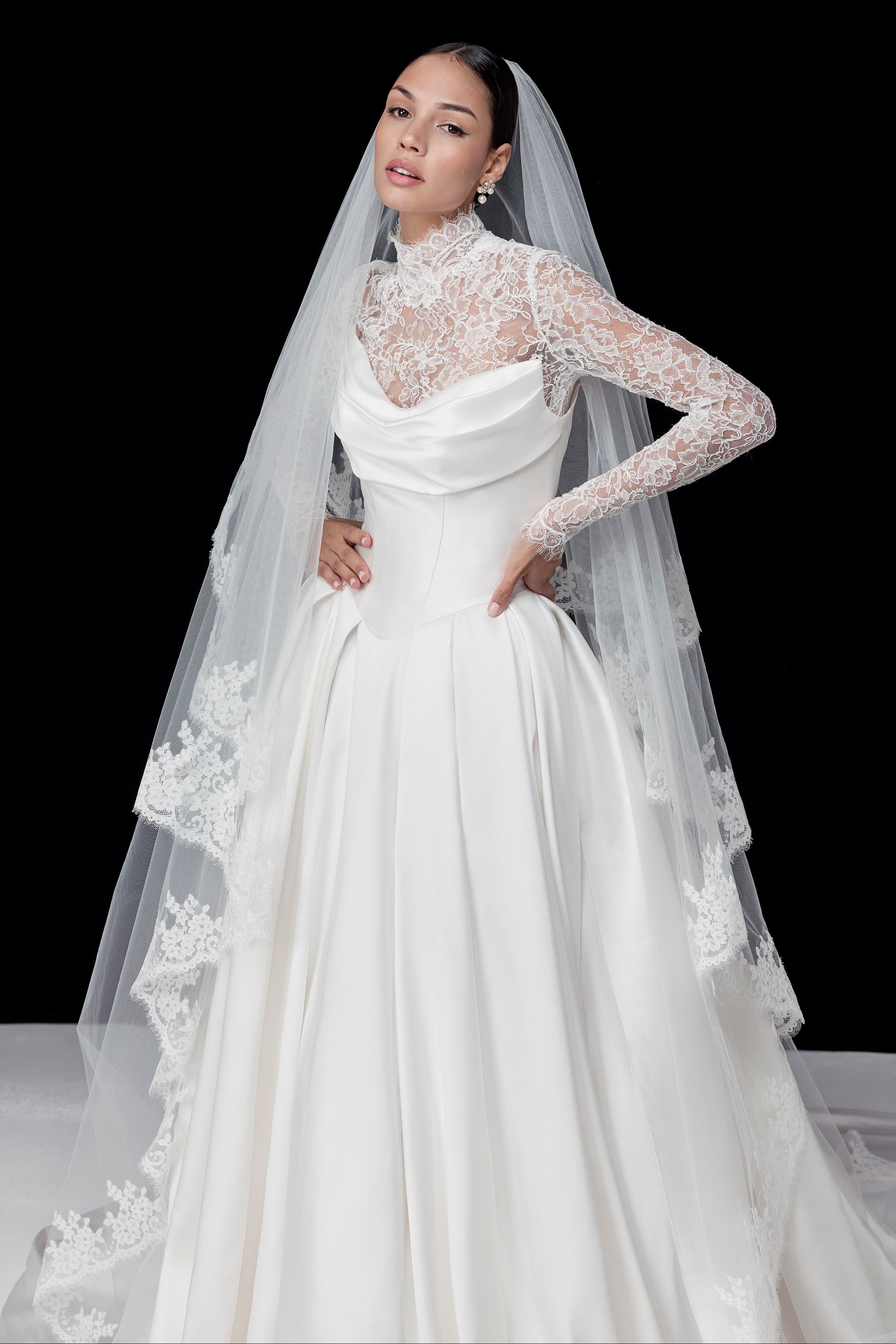 silk Mikado swoop neckline with a basque waist and pleated skirt