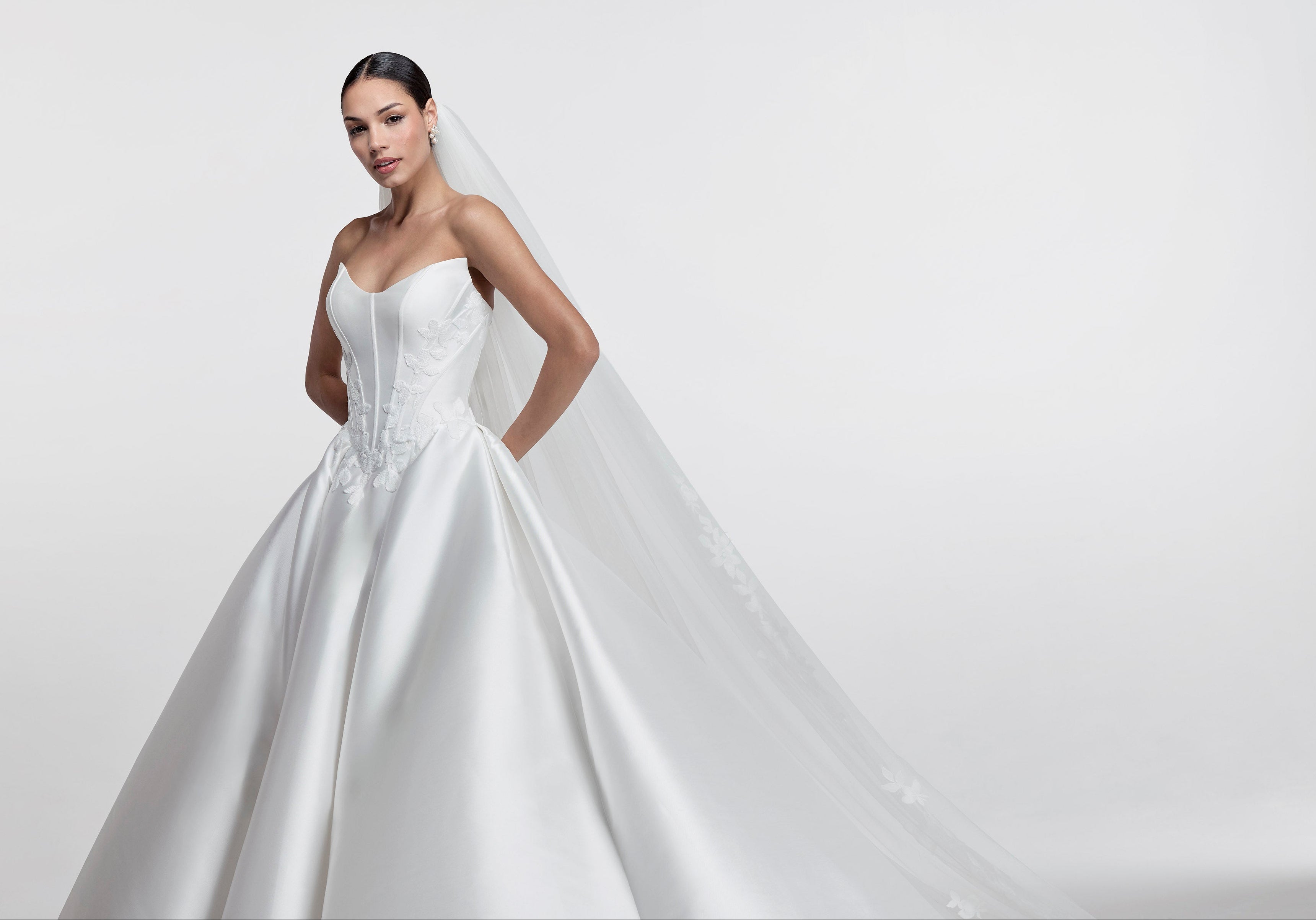 Josephine Scott strapless A-Line wedding dress with basque waistline with lace applique and matching veil