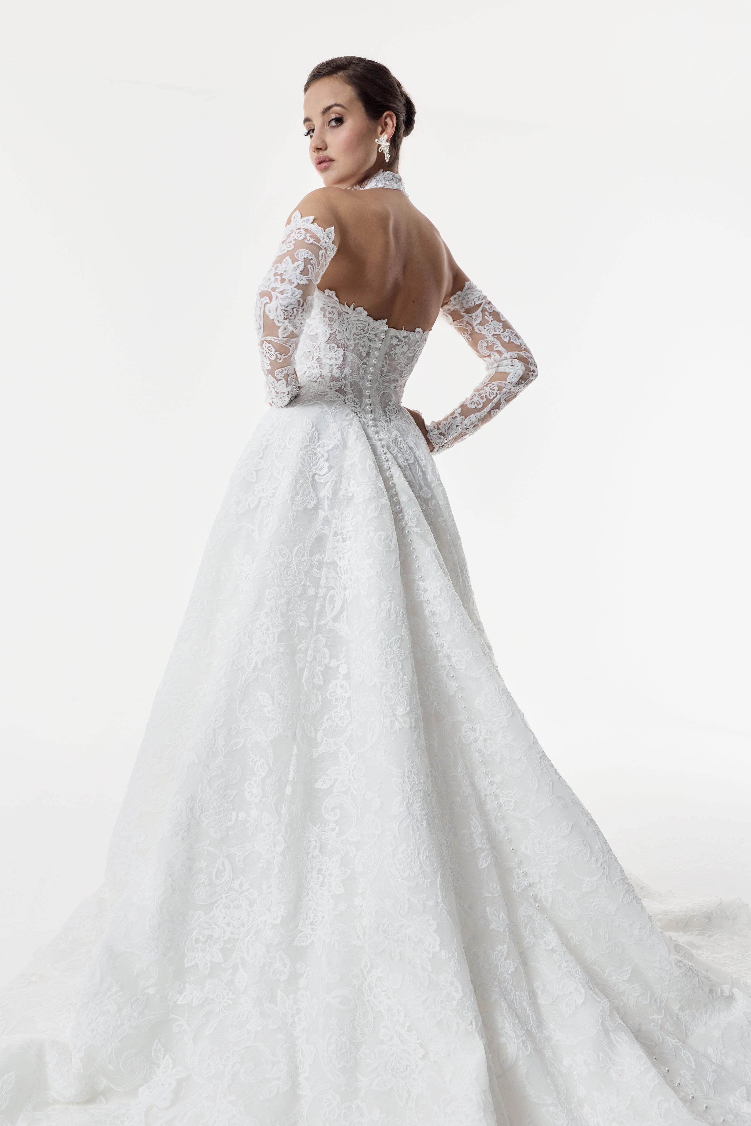 strapless sweetheart neckline corset A-line dress with embroidered lace layered over delicate Chantilly lace with matching sleeves and choker and pearl buttons