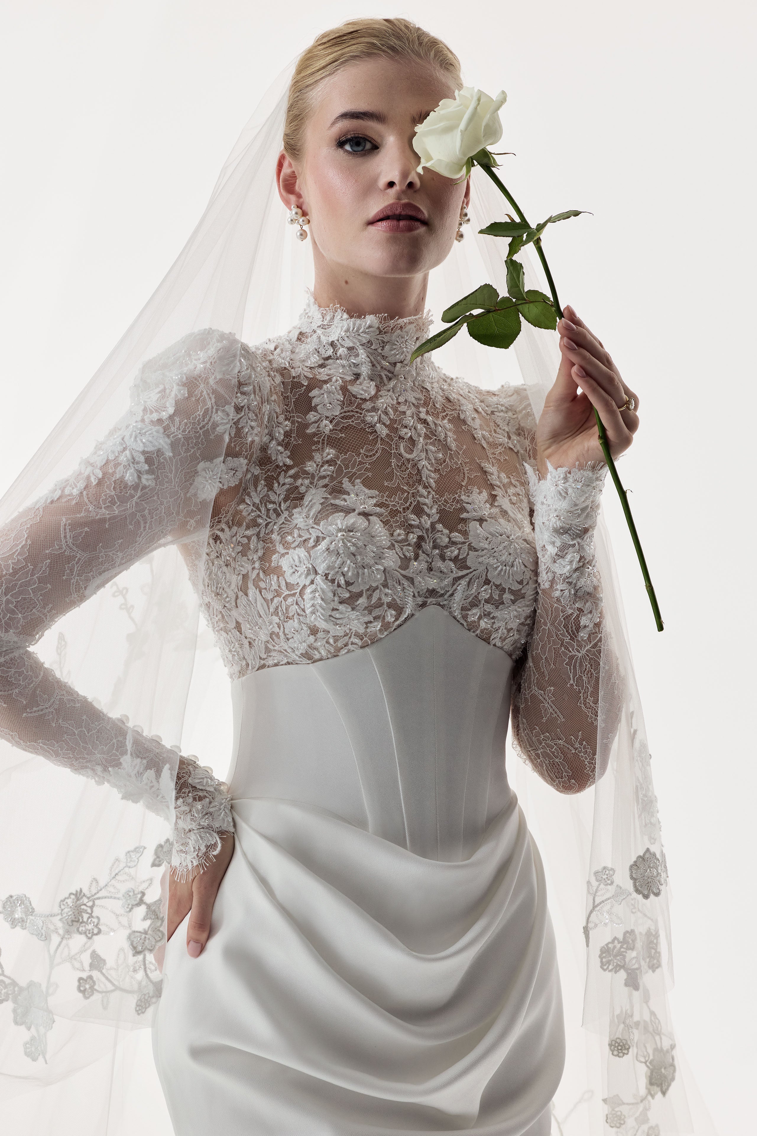 high neckline encrusted lace sleeves and bust, corset draped Japanese crepe skirt with illusion lace train dress