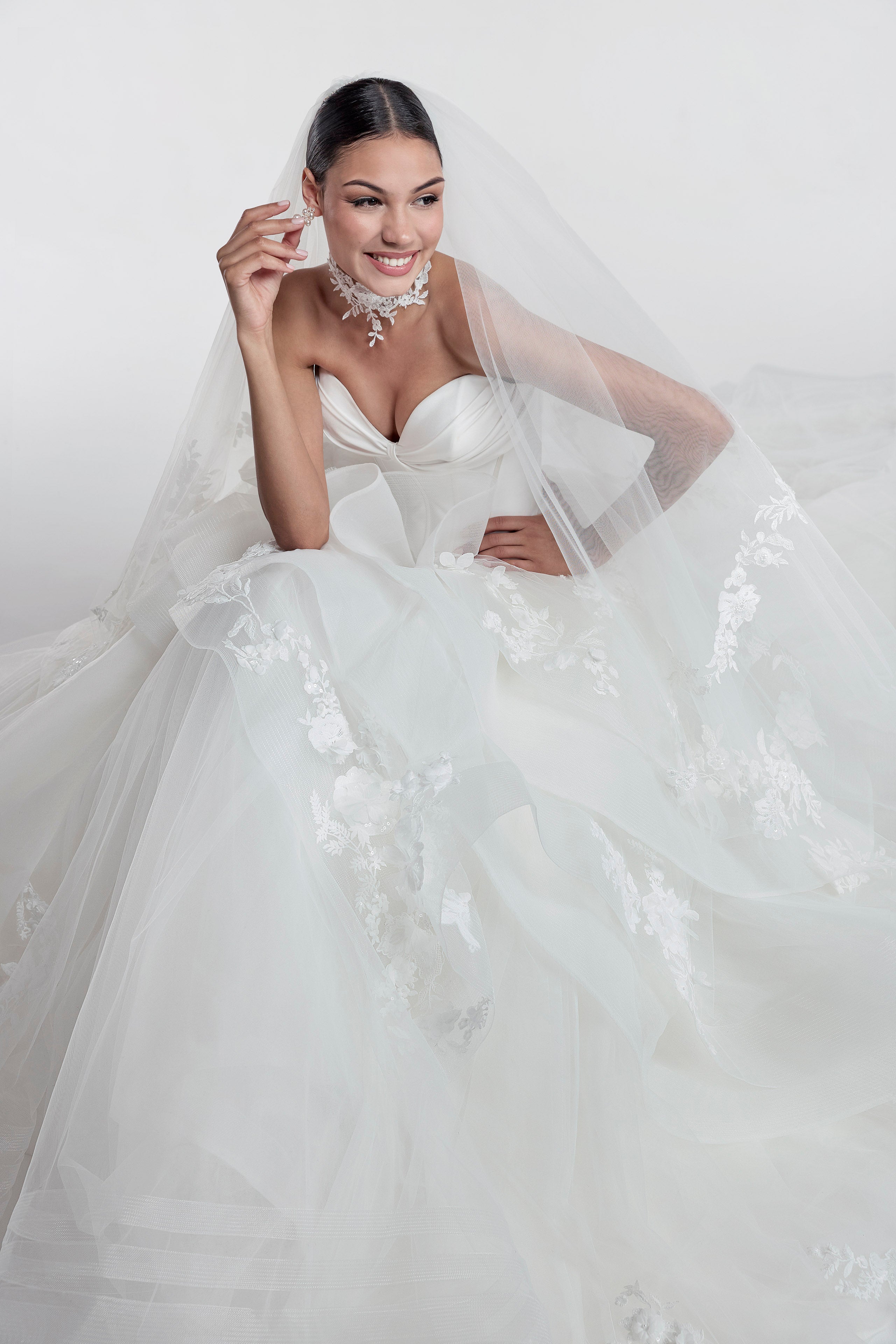 princess gown with structured boned sweetheart bodice and layered tulle skirt with lace applique and horsehair trim