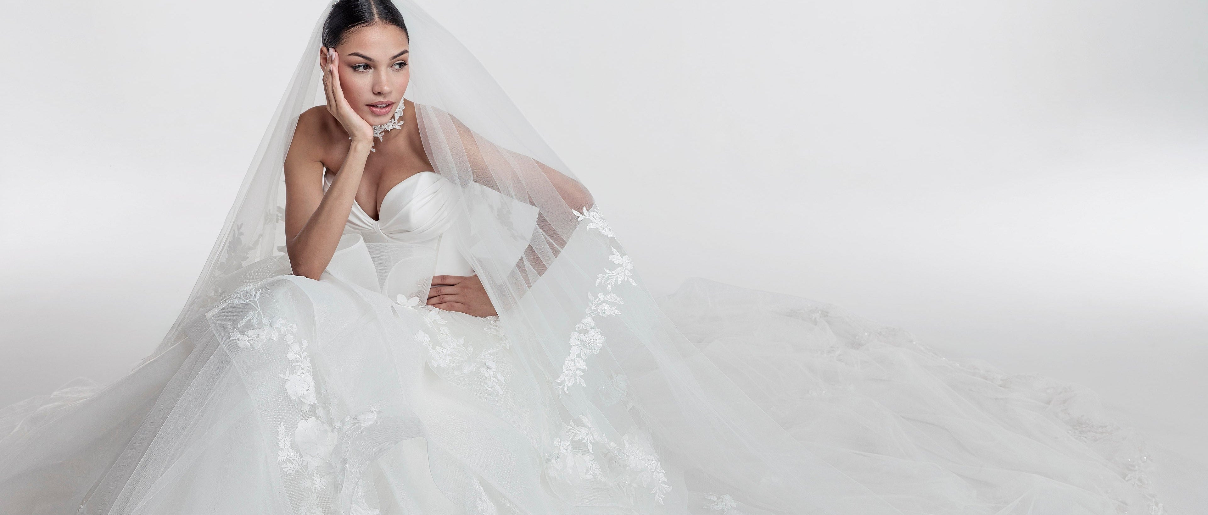princess gown with structured boned sweetheart bodice and layered tulle skirt with lace applique and horsehair trim