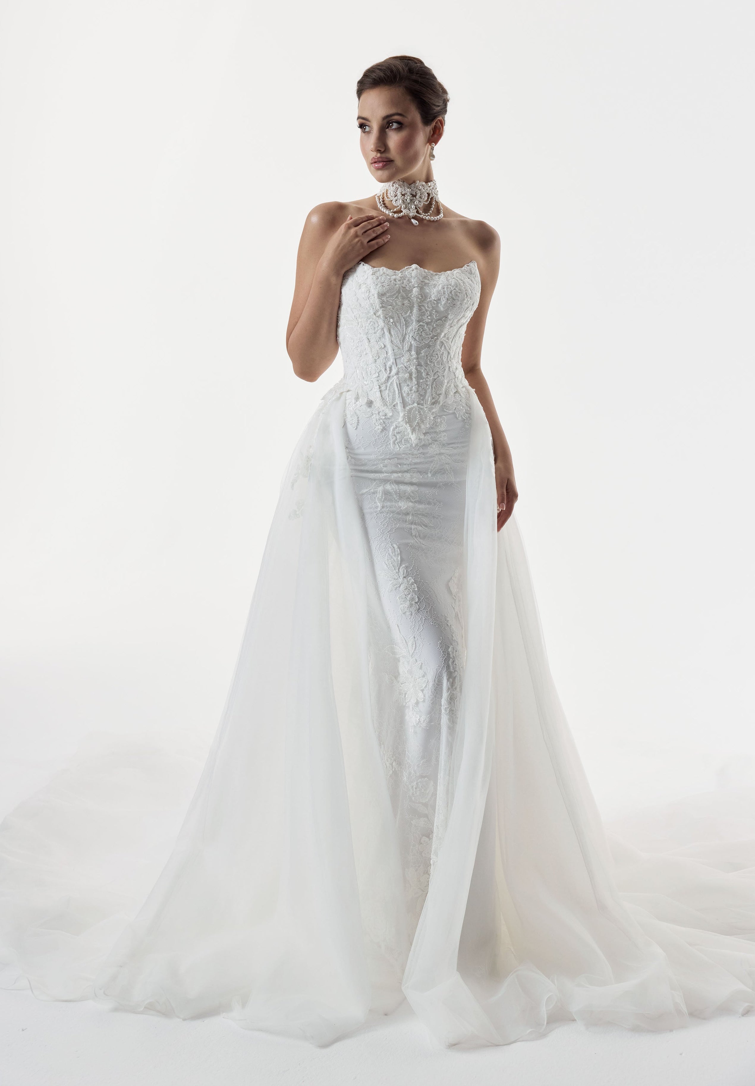 strapless scoop neckline embellished lace applique layered over Chantilly lace corset bodice basque waist with a detachable fitted skirt with choker