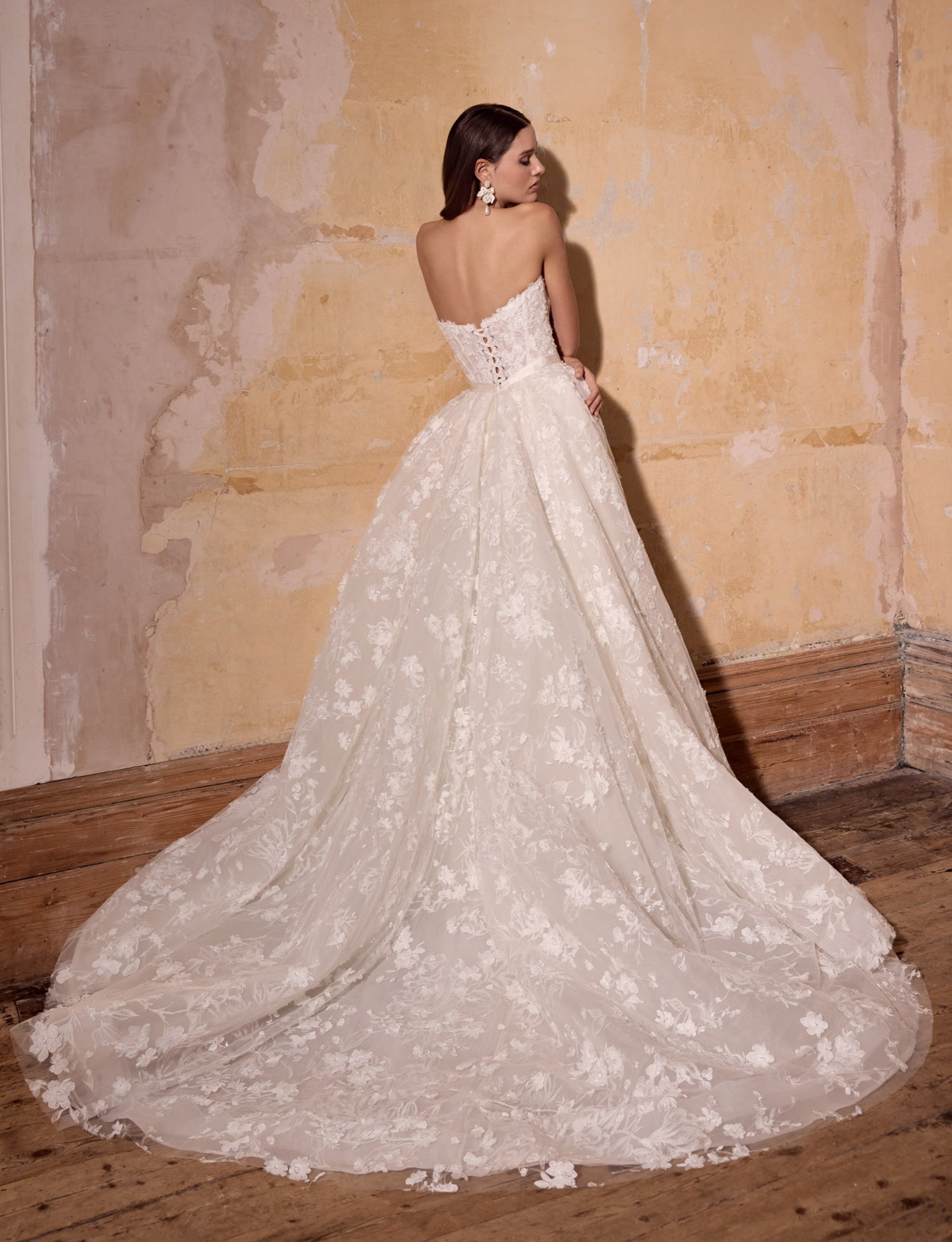 strapless A-line ballgown of 3d floral lace over rose-printed organza, lace up back with lux silk ribbon belt