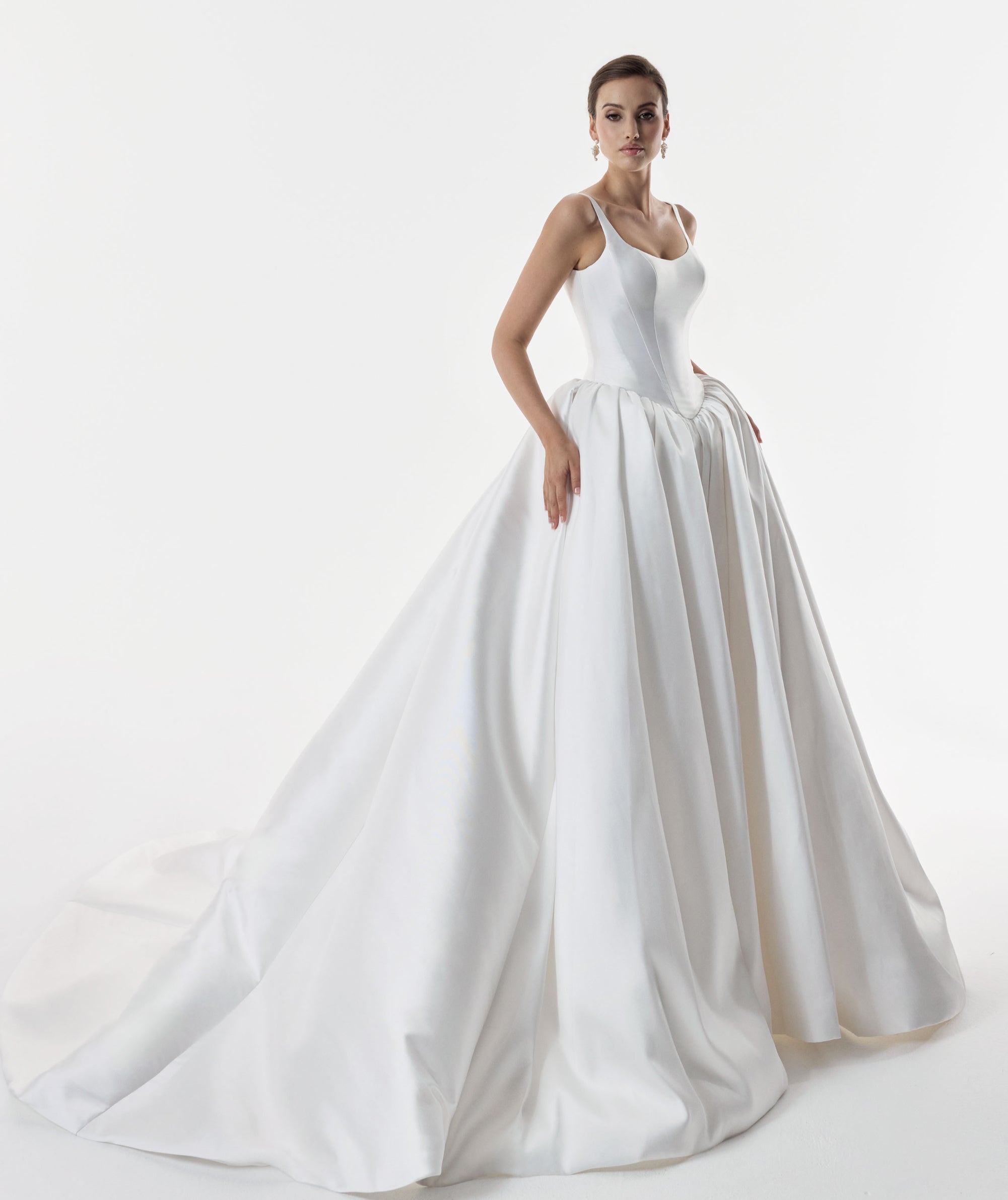 square and scoop strap neckline with a flattering basque waist corset and ballgown A-line skirt