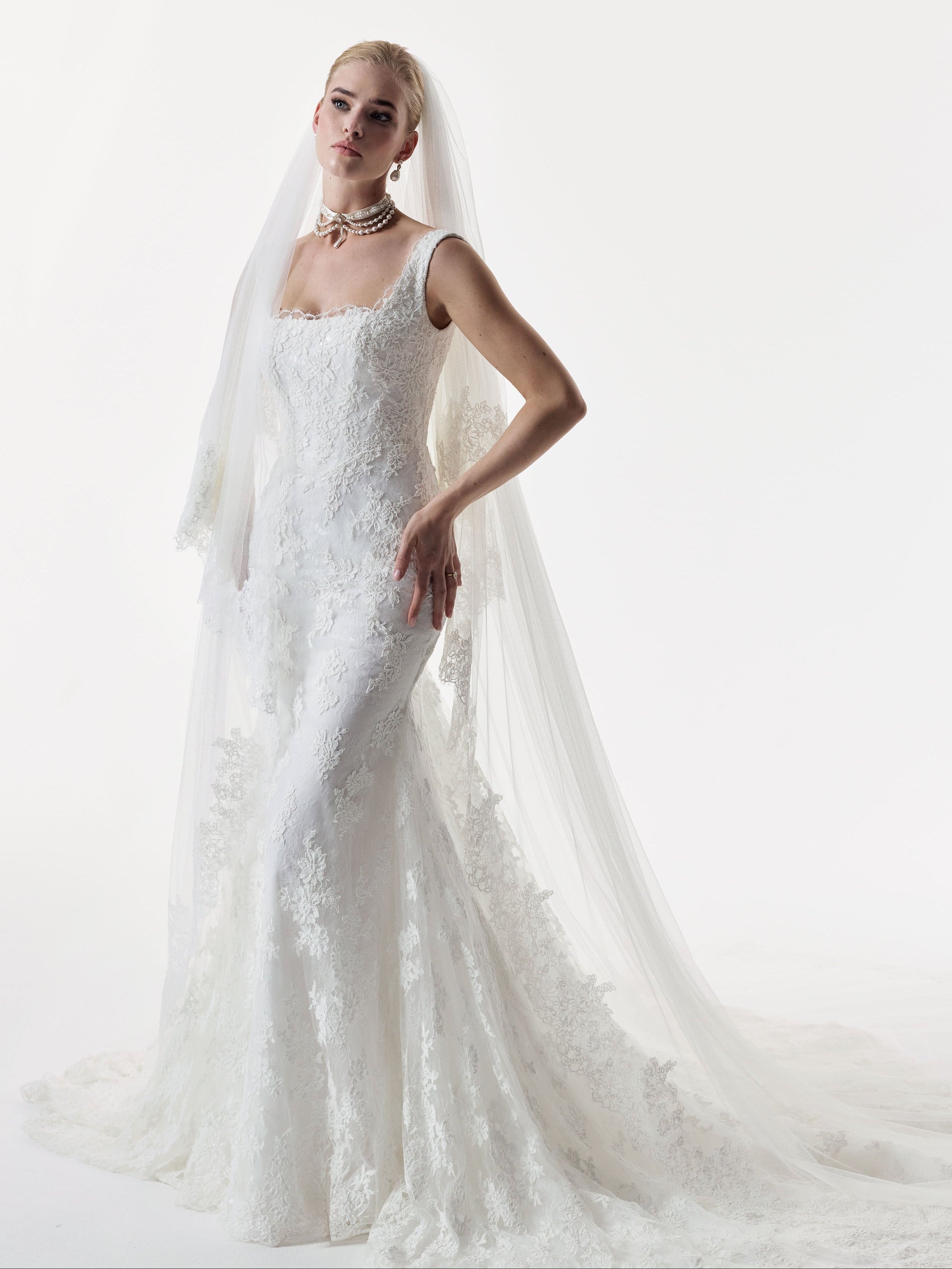 square neckline fitted sheath dress with corded lace layered over delicate Chantilly lace with matching veil