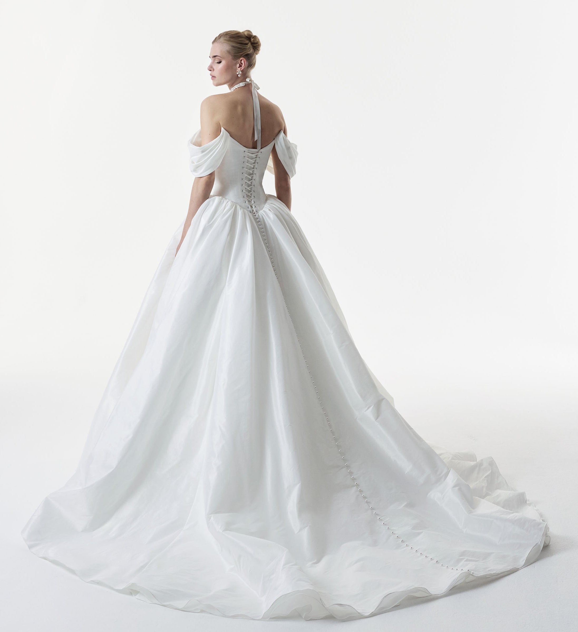 off the shoulder straps and a tightly ruched metallic taffeta bodice with lace up corset back and basque waist full ballgown A-Line skirt with choker