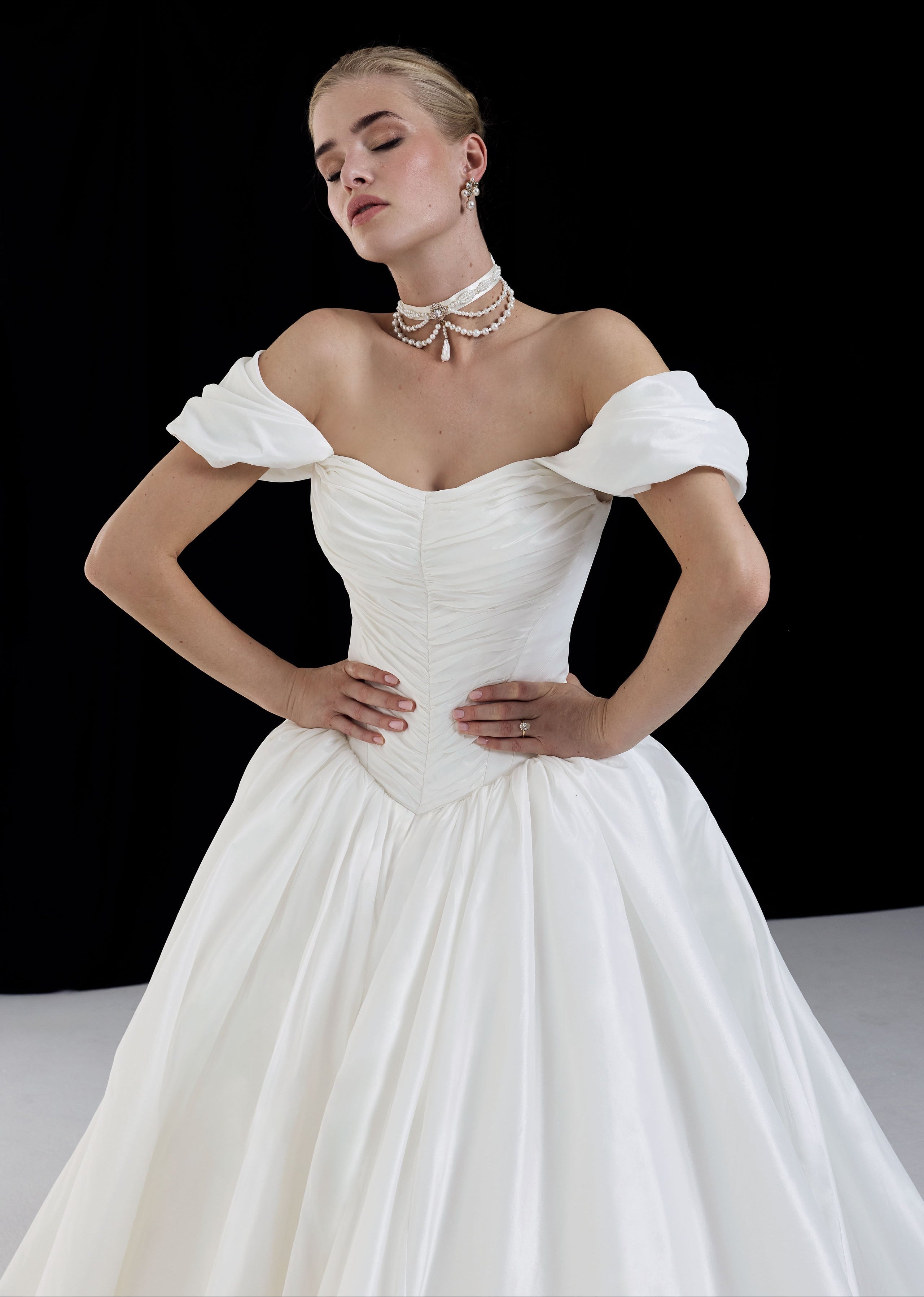 off the shoulder straps and a tightly ruched metallic taffeta bodice and basque waist full ballgown A-Line skirt