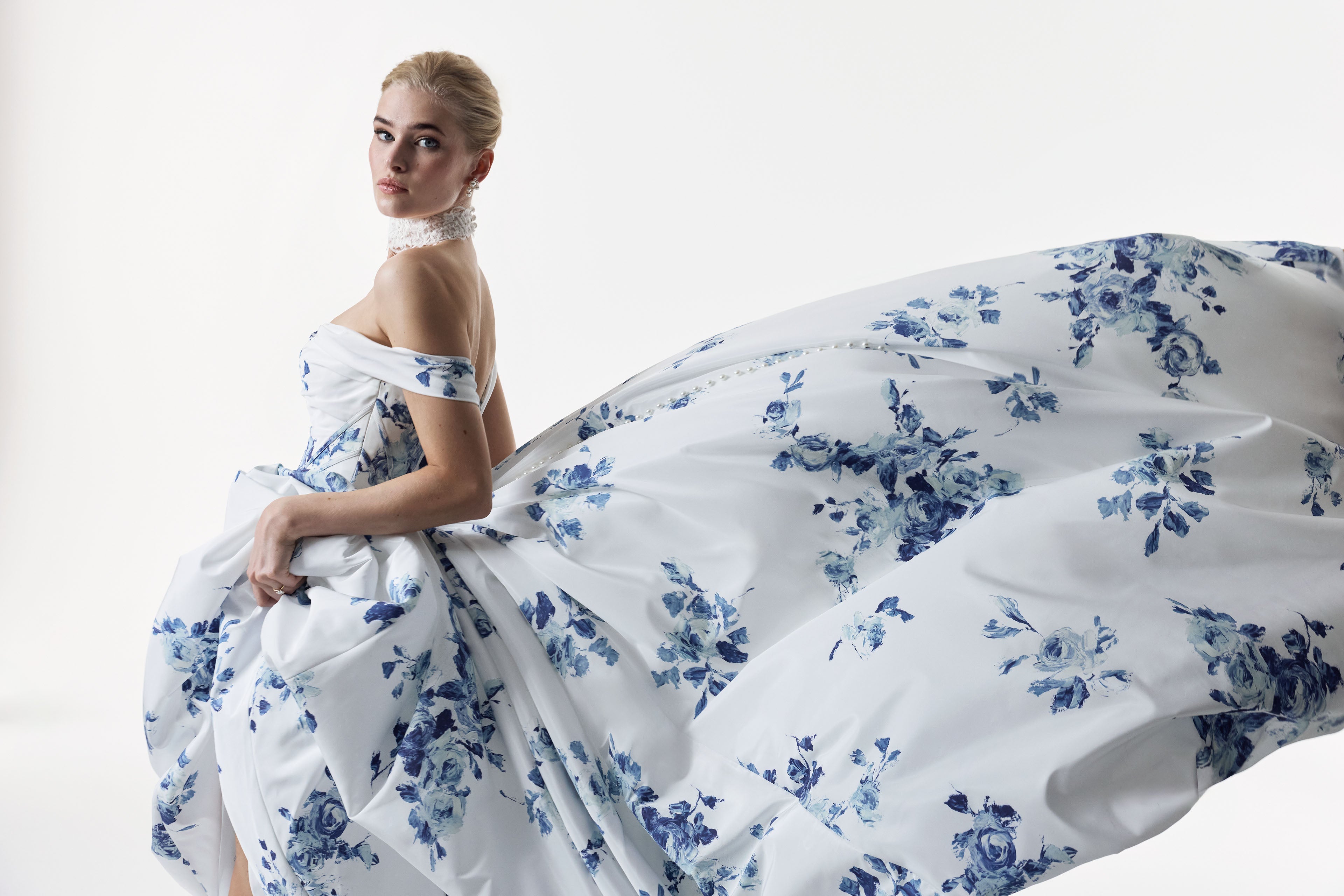 classic ivory and topaz floral print bardot neckline and corset basque waist and ruched pick-up skirt leg slit detailing