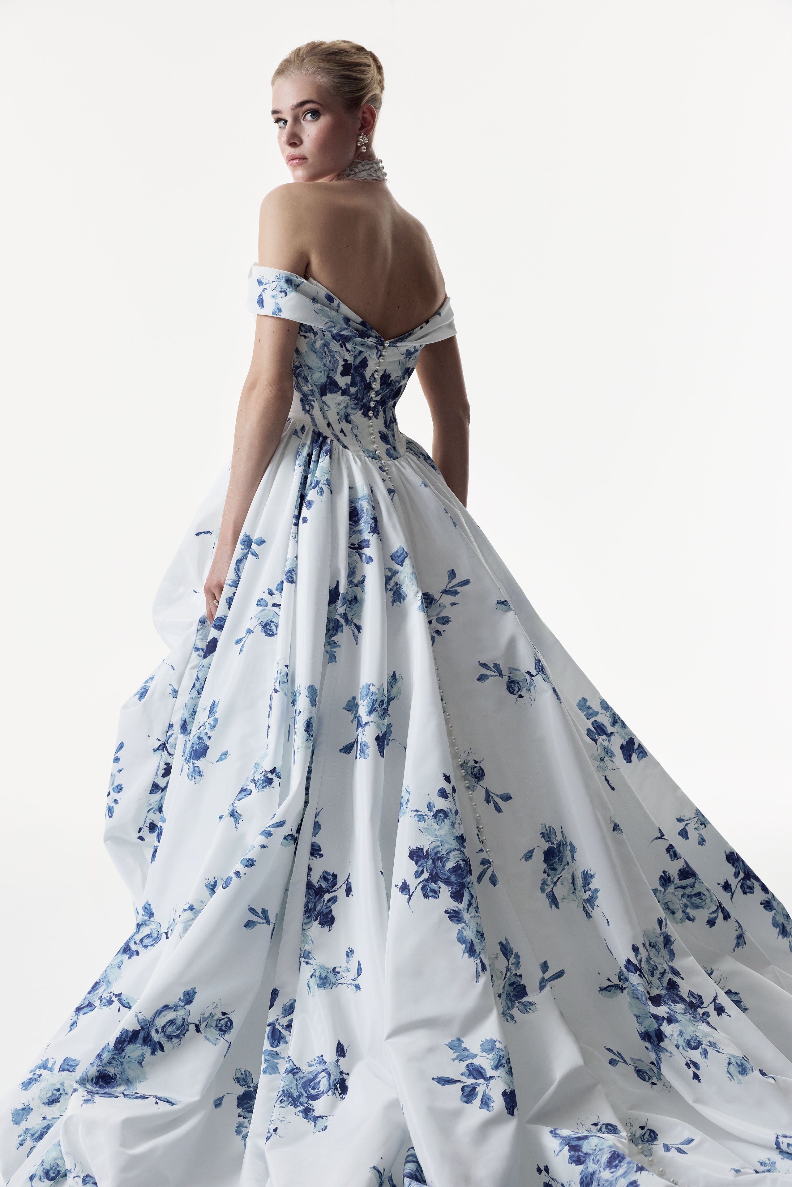 classic ivory and topaz floral print bardot neckline and corset basque waist and ruched pick-up skirt leg slit detailing