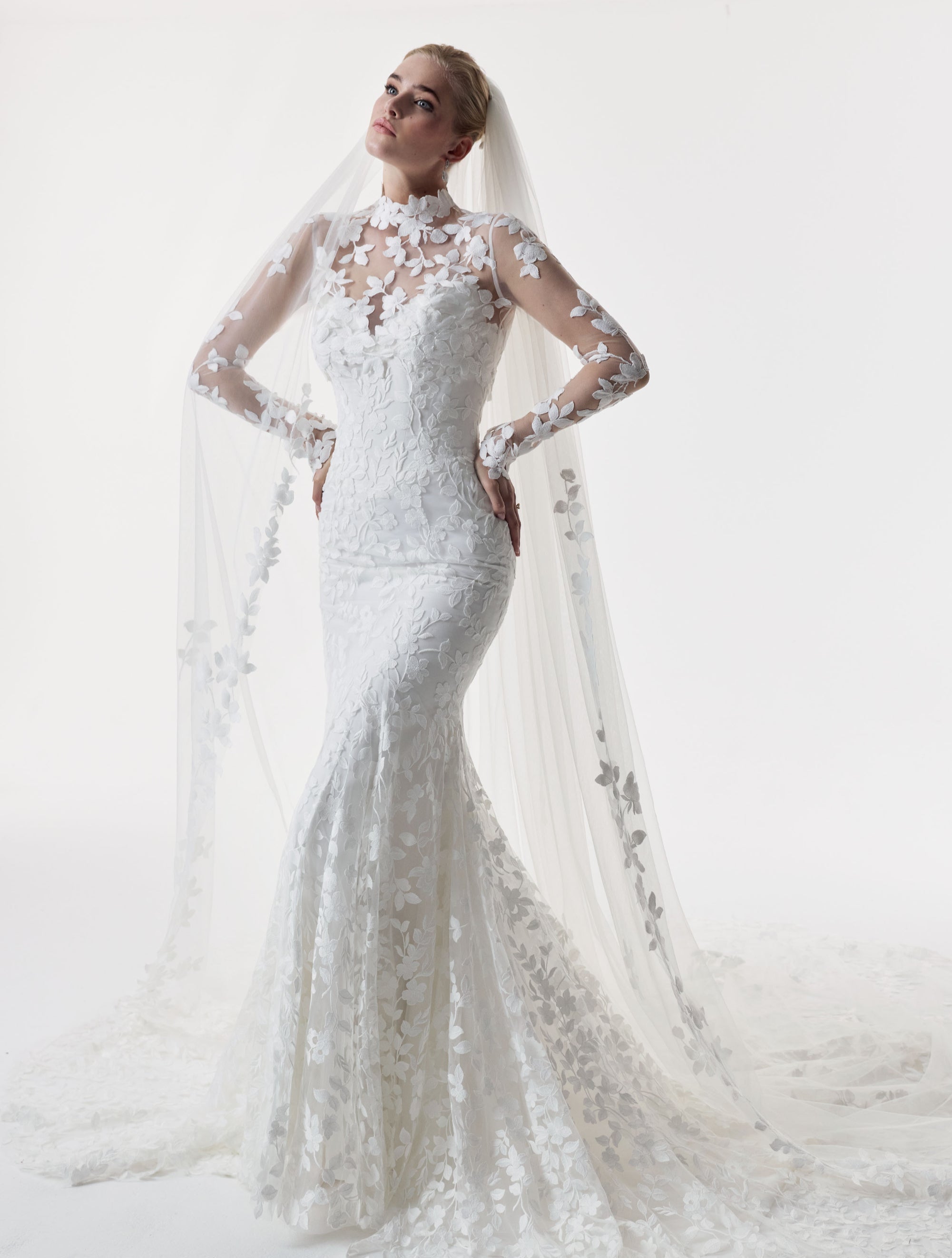 strapless sweetheart neckline fitted sheath dress leaf lace emrbroidery applique layered over delicate Chantilly lace with matching high neck lace sleeve topper and single tier lace veil