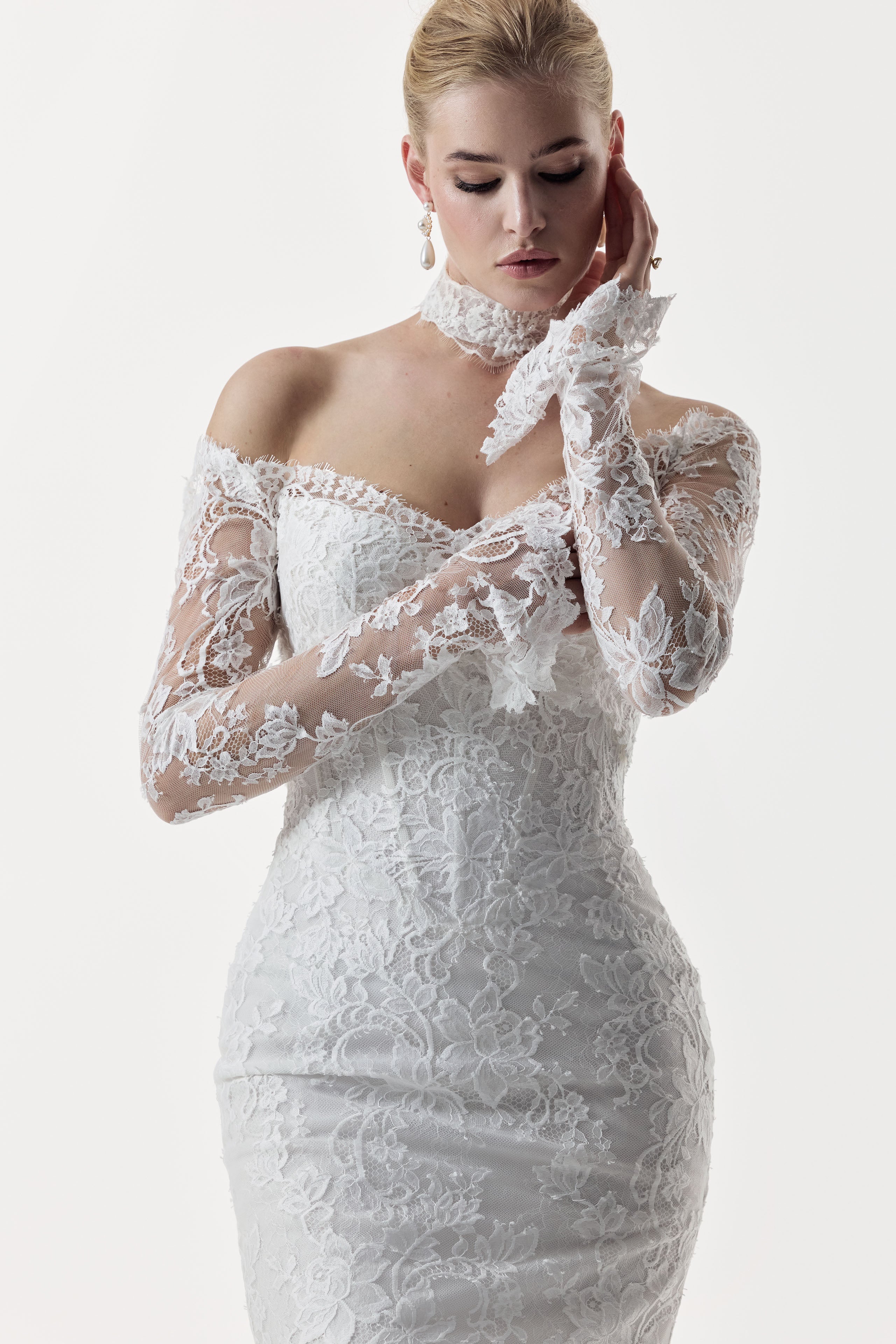 sweetheart neckline and fitted strapless Chantilly lace bodice with basque waist