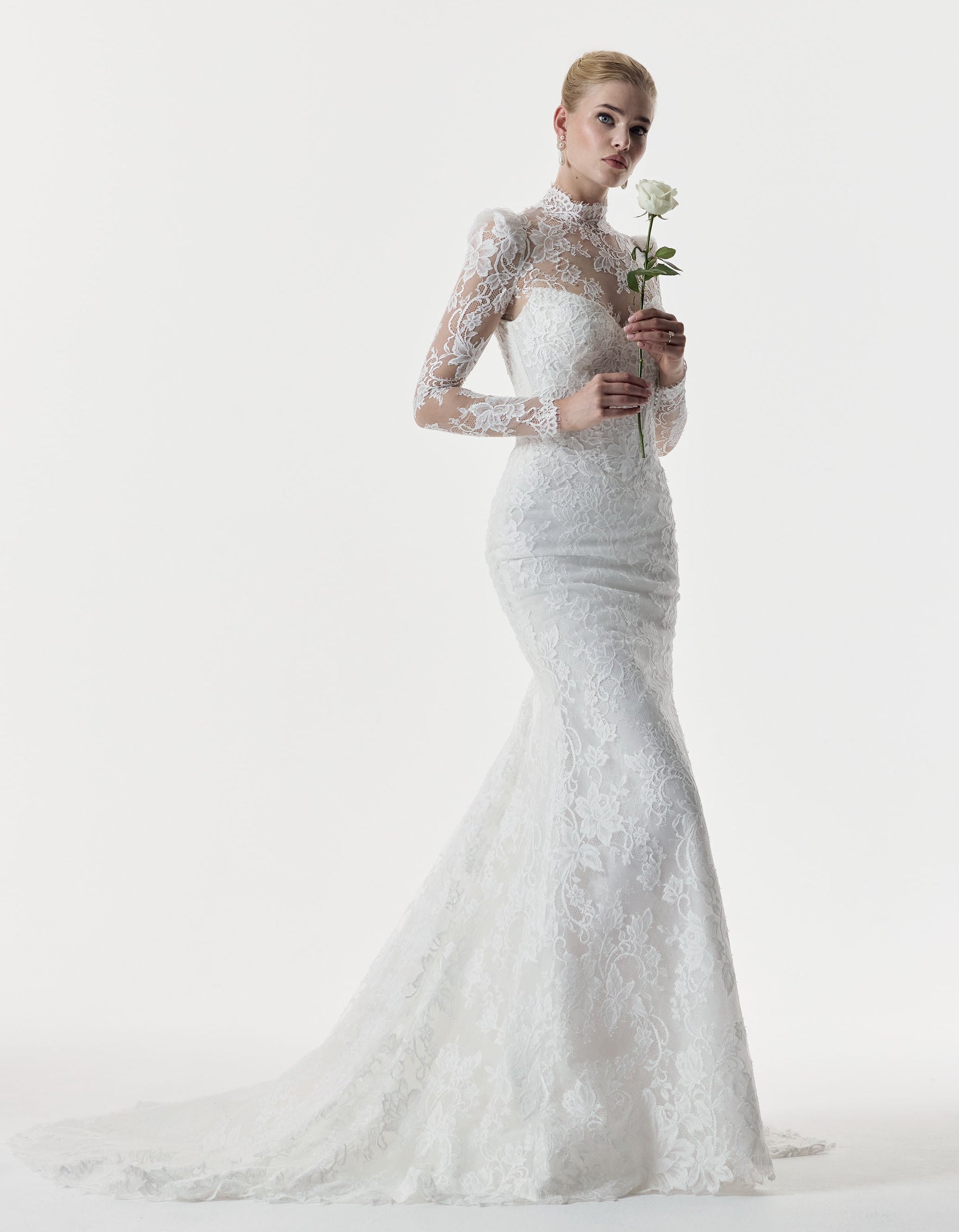 sweetheart neckline and fitted strapless Chantilly lace bodice with basque waist with high neck lace topper