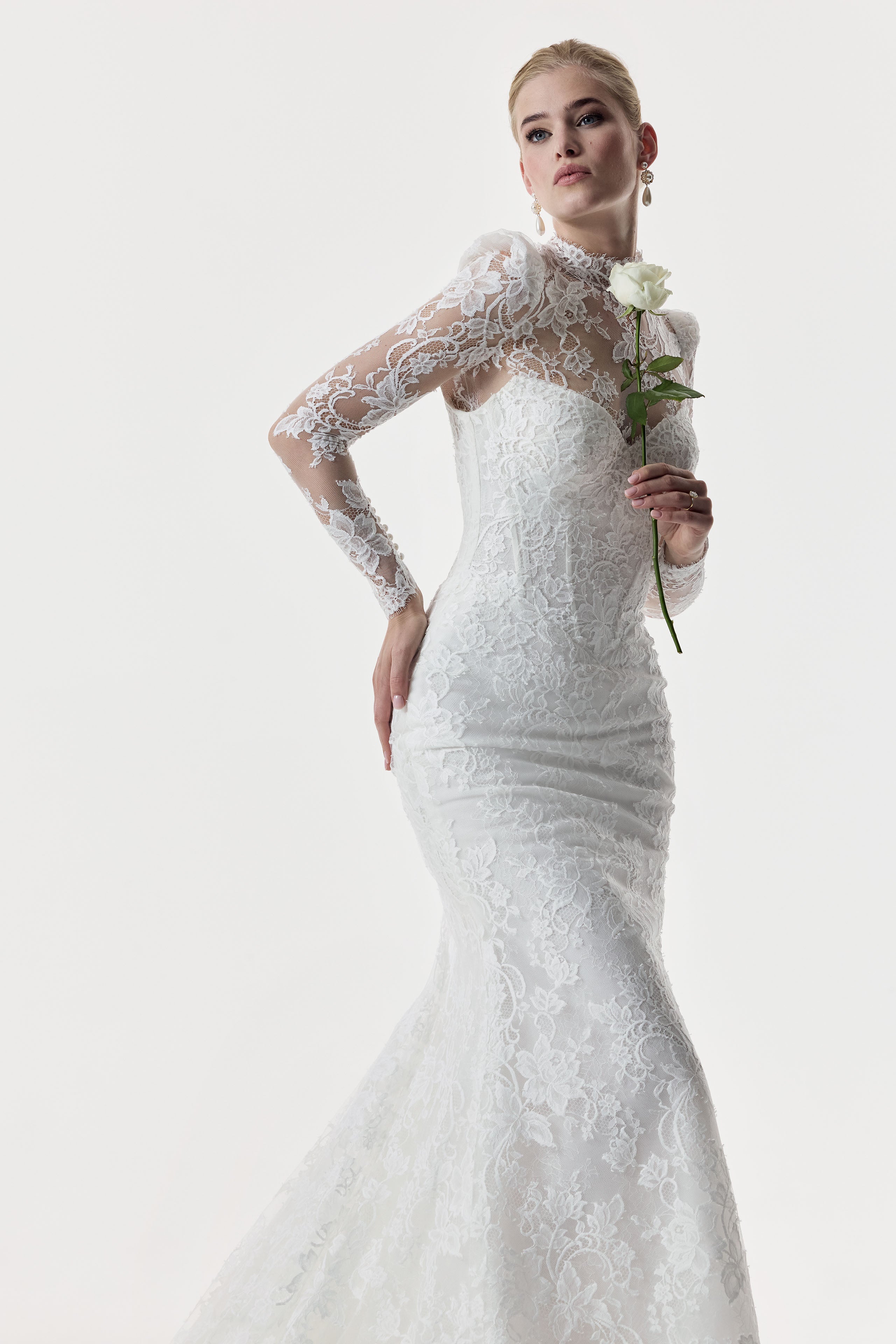 sweetheart neckline and fitted strapless Chantilly lace bodice with basque waist with high neck lace topper