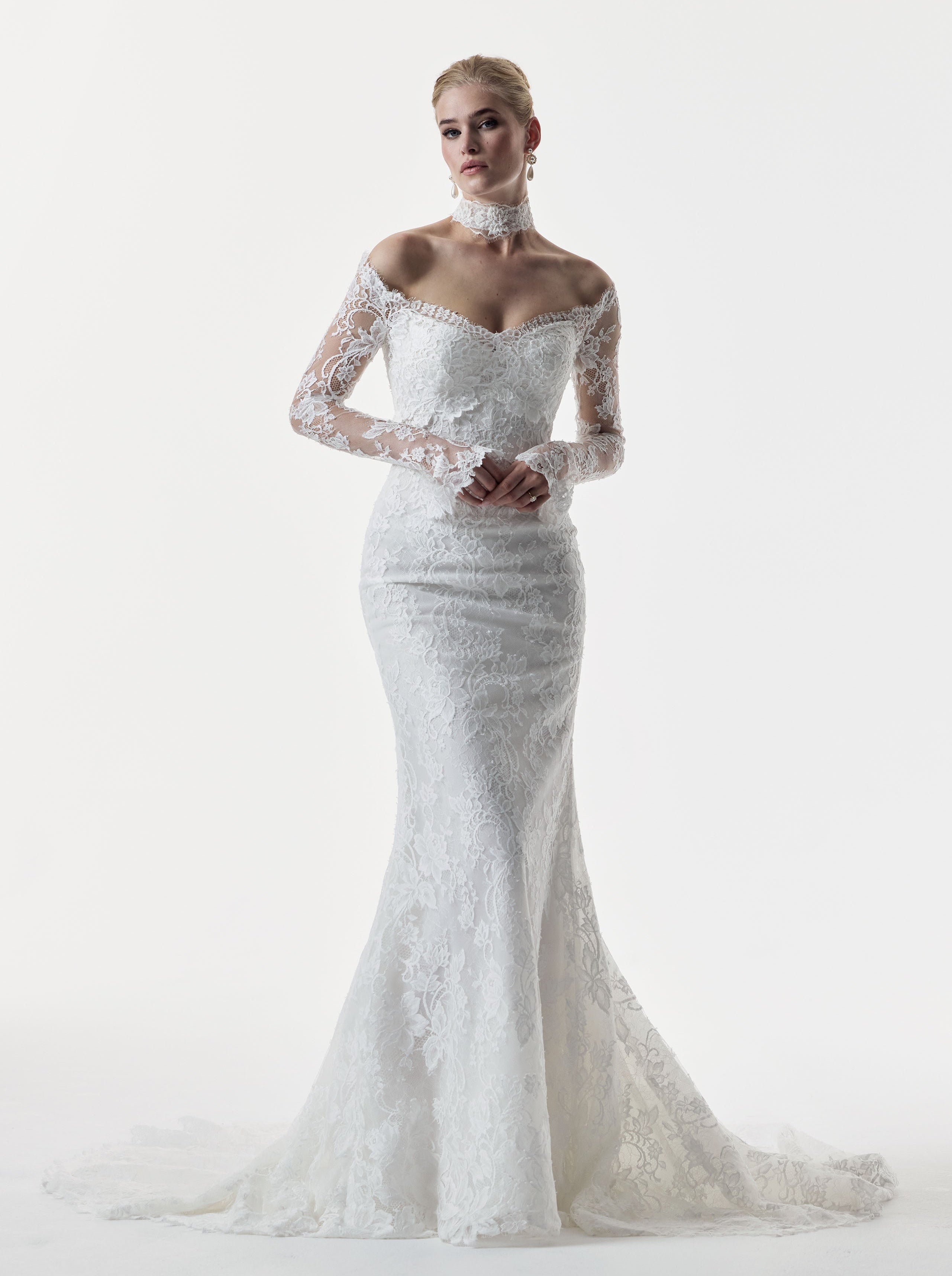 sweetheart neckline and fitted strapless Chantilly lace bodice with basque waist with matching lace sleeves and choker