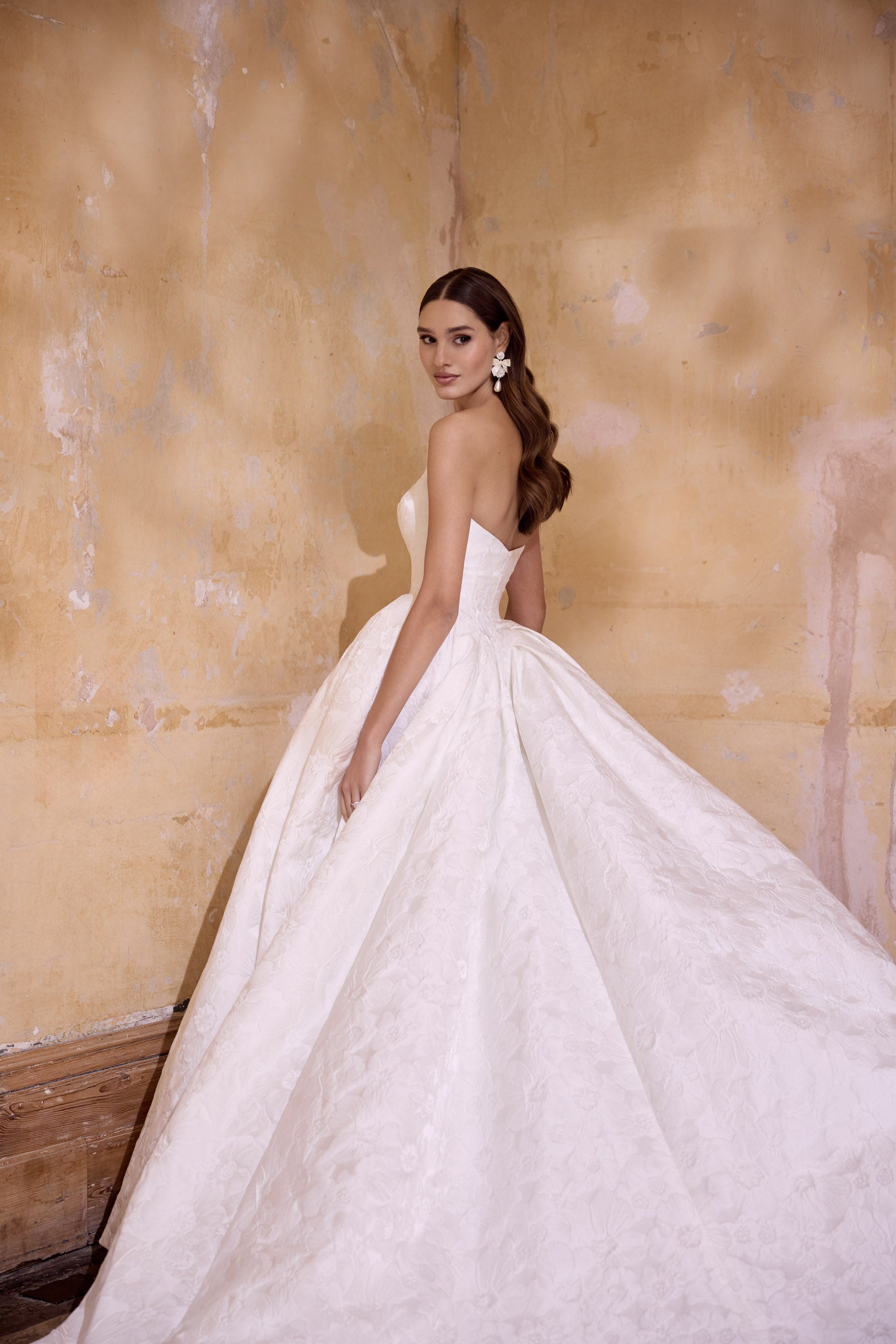 strapless scoop neckline embossed jacquard ballgown silhouette with dramatic train