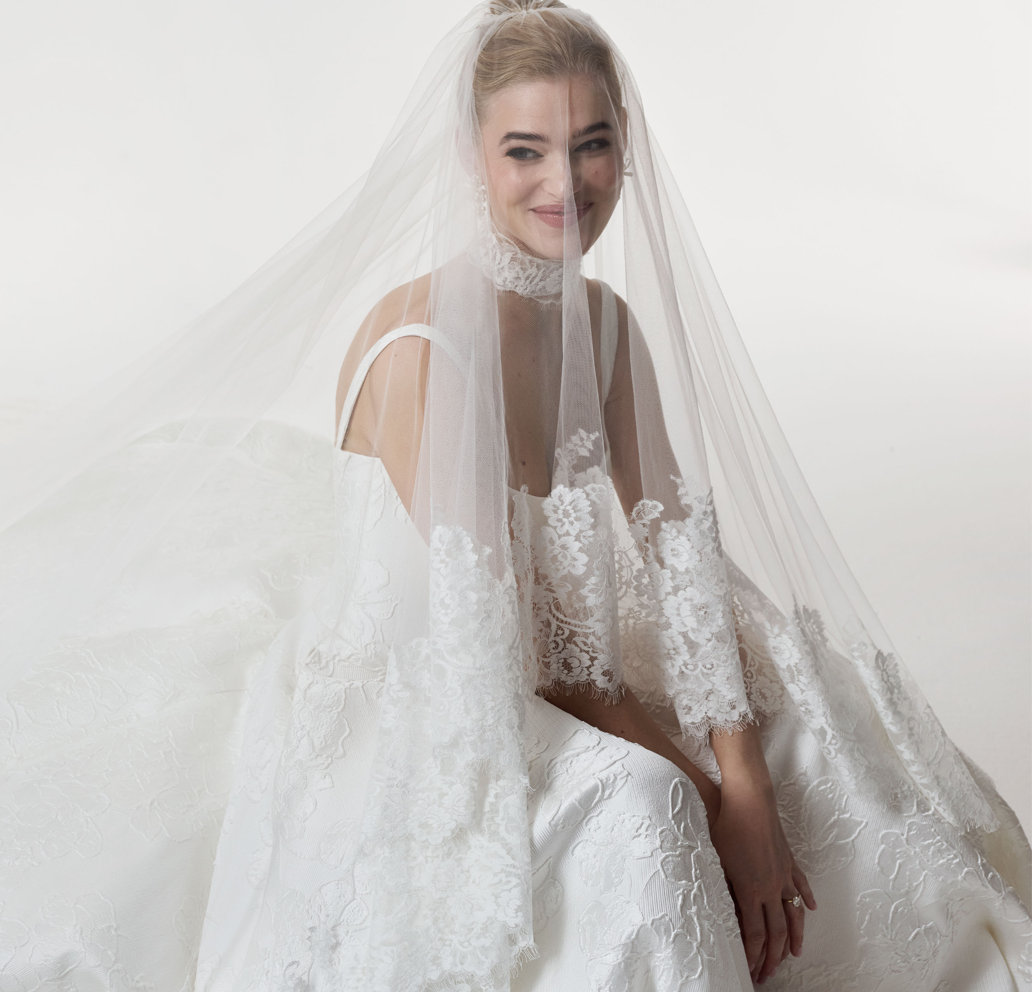 square neckline with basque waist A-Line skirt in silk embossed jacquard with a lace choker and veil