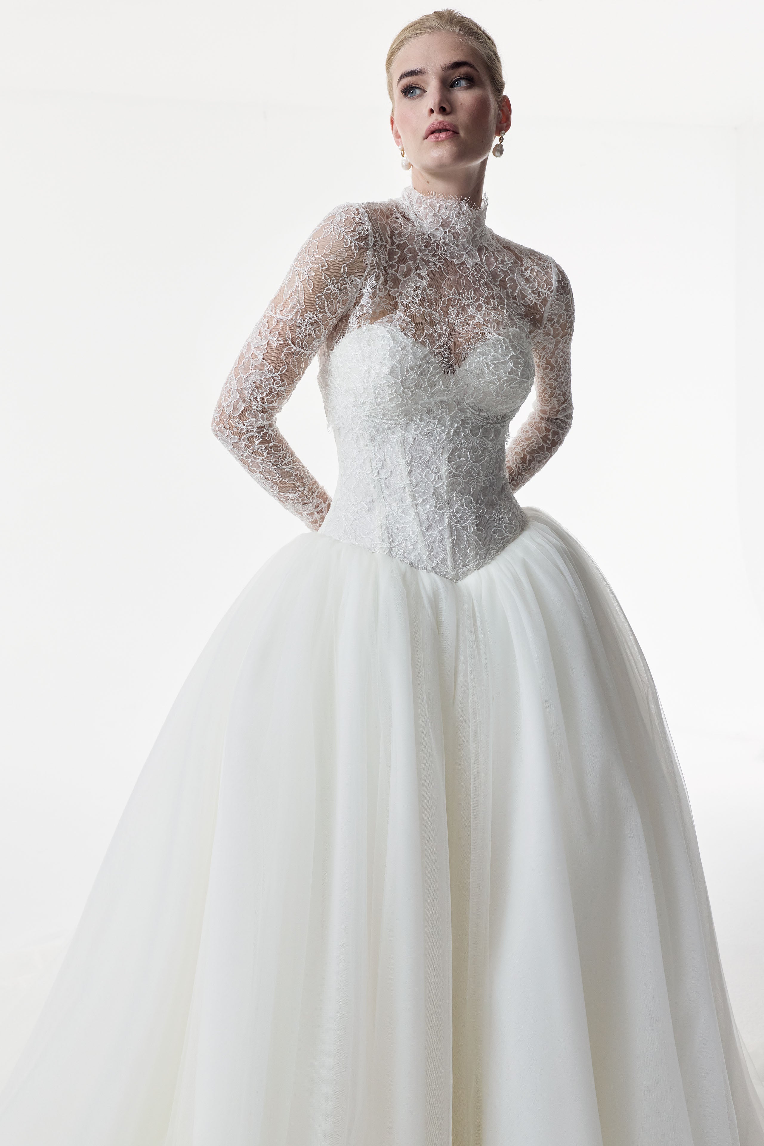 strapless sweetheart neckline corset basque waist bodice in corded French lace and full ballgown skirt in soft tulle with matching high neck lace sleeve topper
